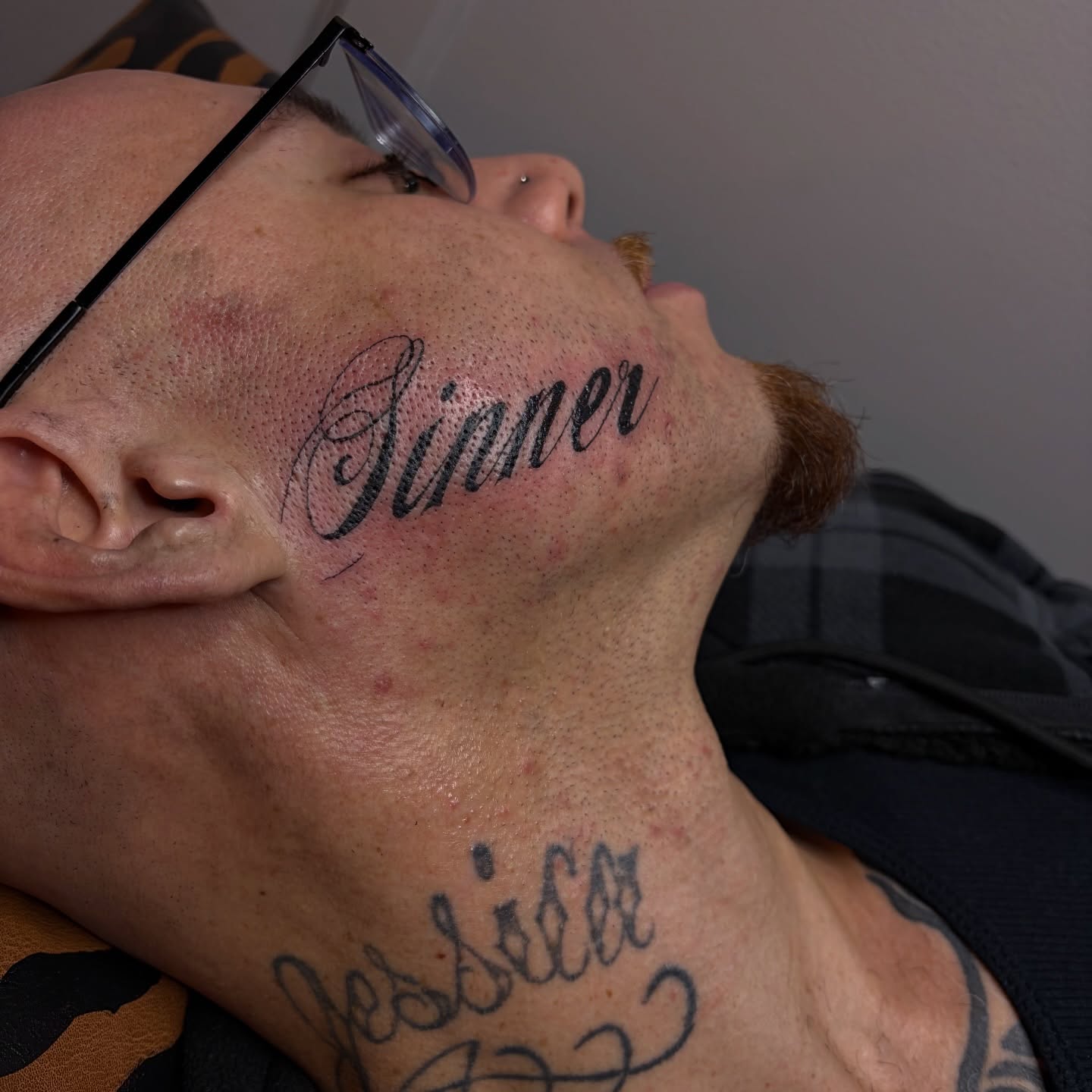 Script lettering lettering script tattoo on the neck by ⚜️Embodied Tattoo⚜️, Columbus, Ohio