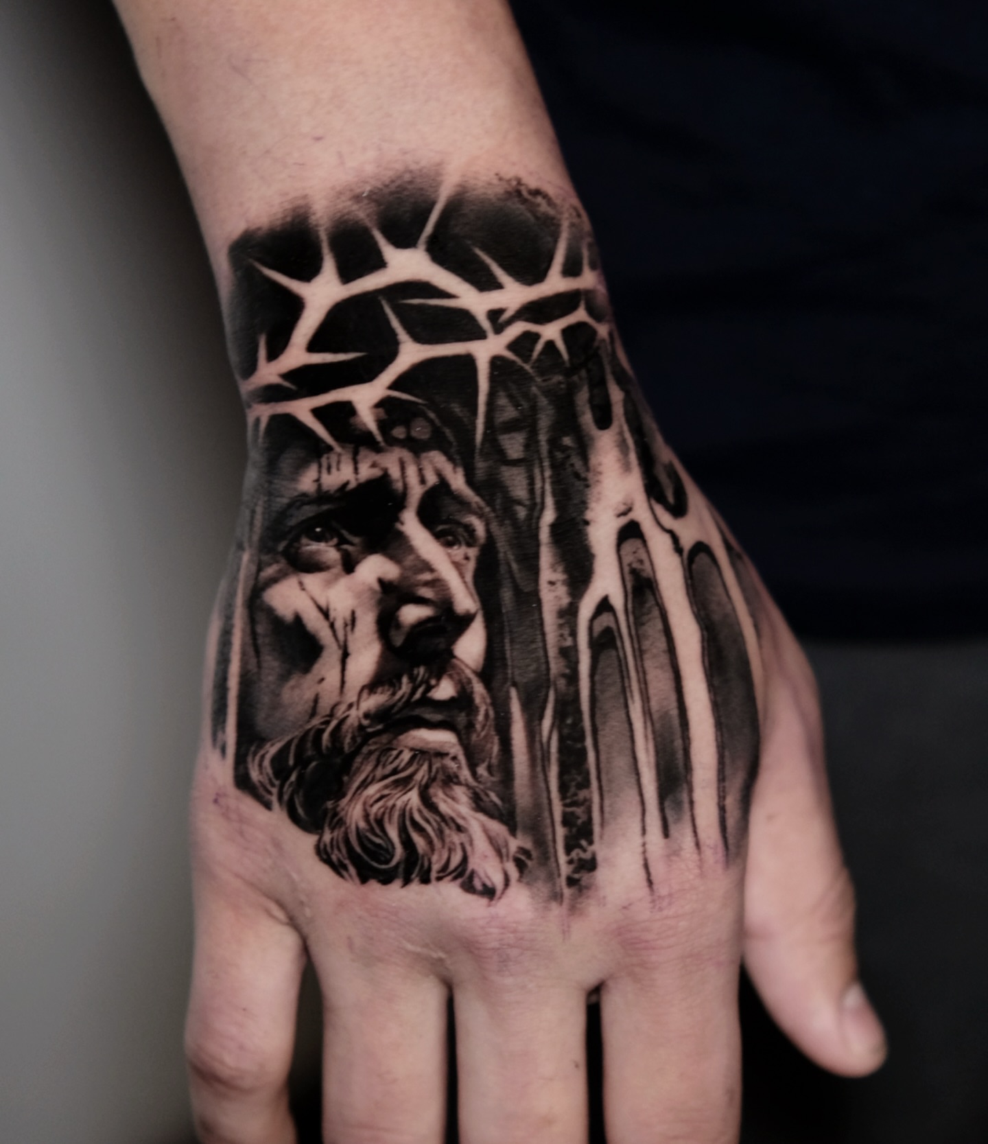 Religious figure realism tattoo on the hand by 𝐌𝐀𝐊𝐒𝐈𝐌 𝐏𝐀𝐓𝐑𝐈𝐂𝐊