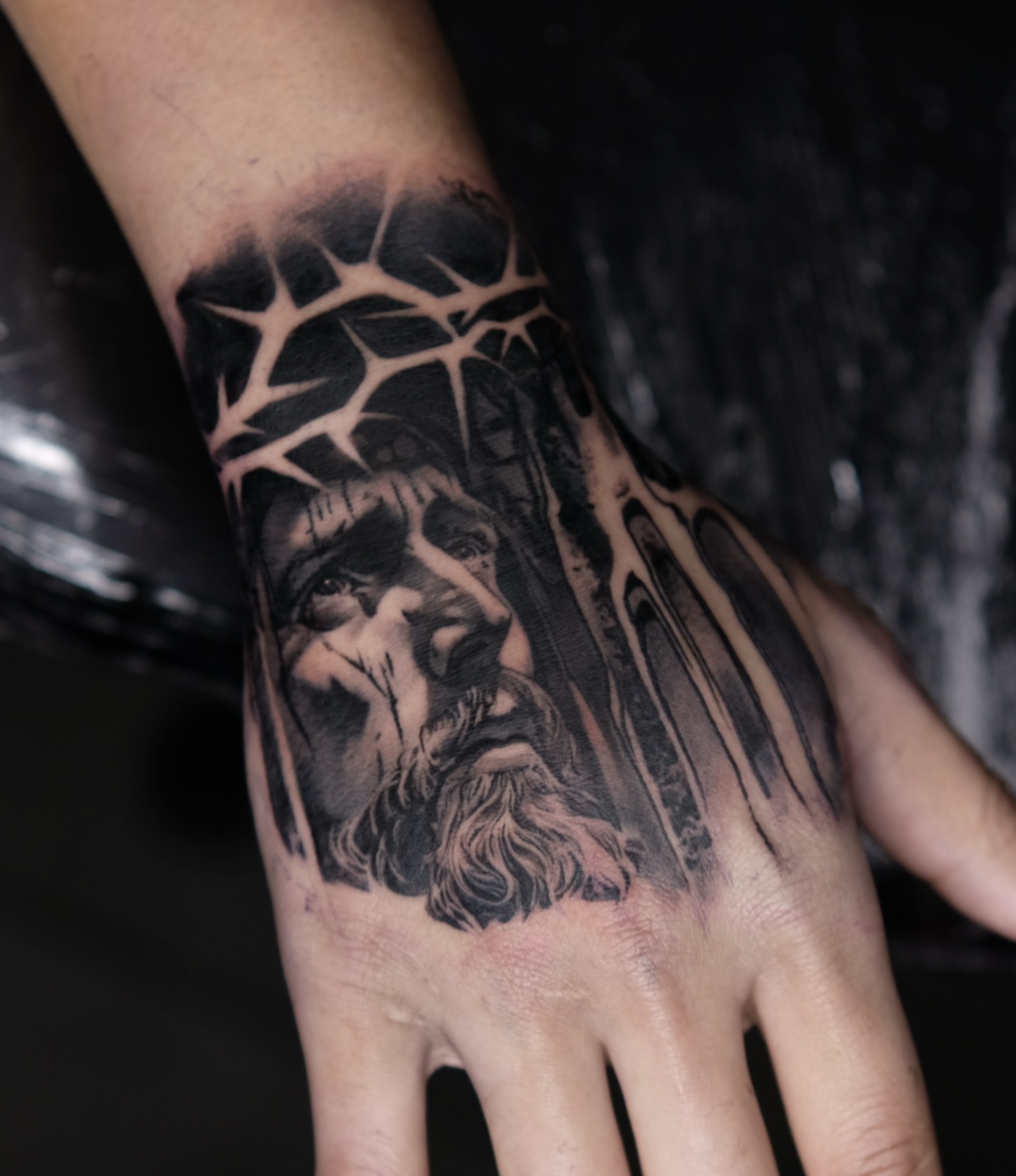Religious figure realism tattoo on the hand by 𝐌𝐀𝐊𝐒𝐈𝐌 𝐏𝐀𝐓𝐑𝐈𝐂𝐊