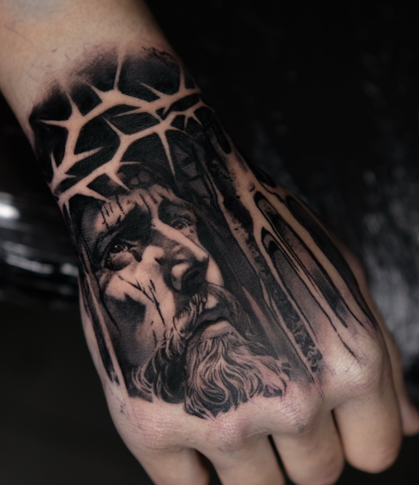 Religious figure realism tattoo on the hand by 𝐌𝐀𝐊𝐒𝐈𝐌 𝐏𝐀𝐓𝐑𝐈𝐂𝐊