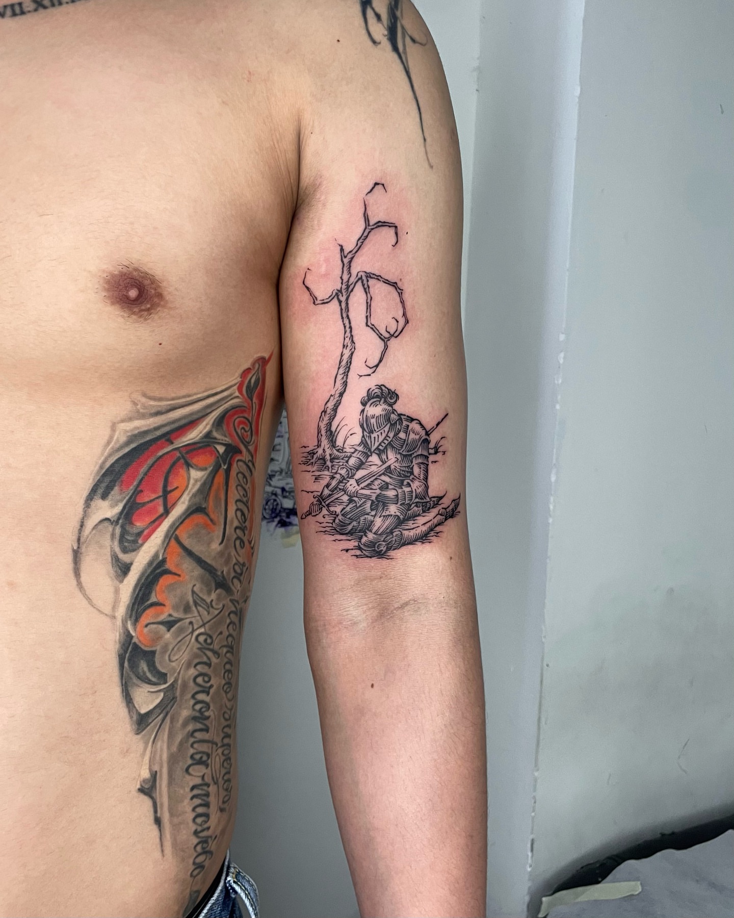 Warrior and tree realism tattoo on the forearm by Anh Đan