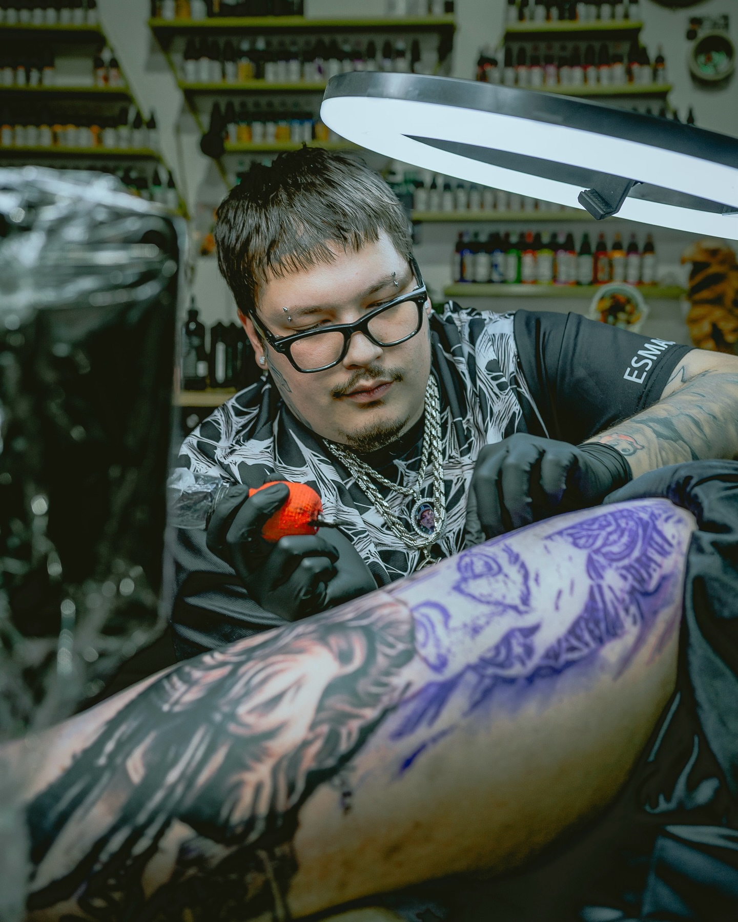 Bird American traditional tattoo on the upper arm by Donald Reynolds
