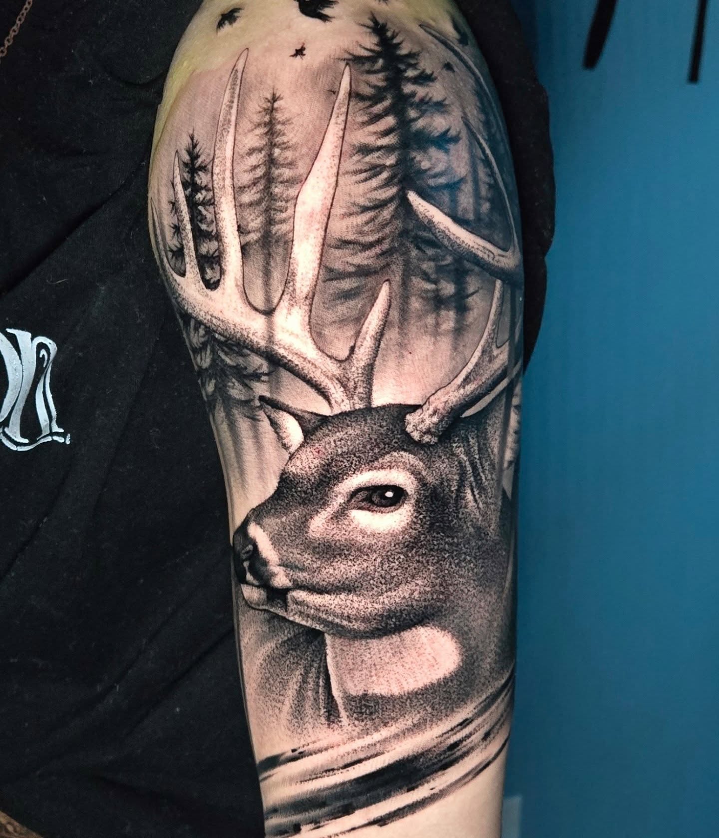 Deer realism tattoo on the forearm by Jeff Stager