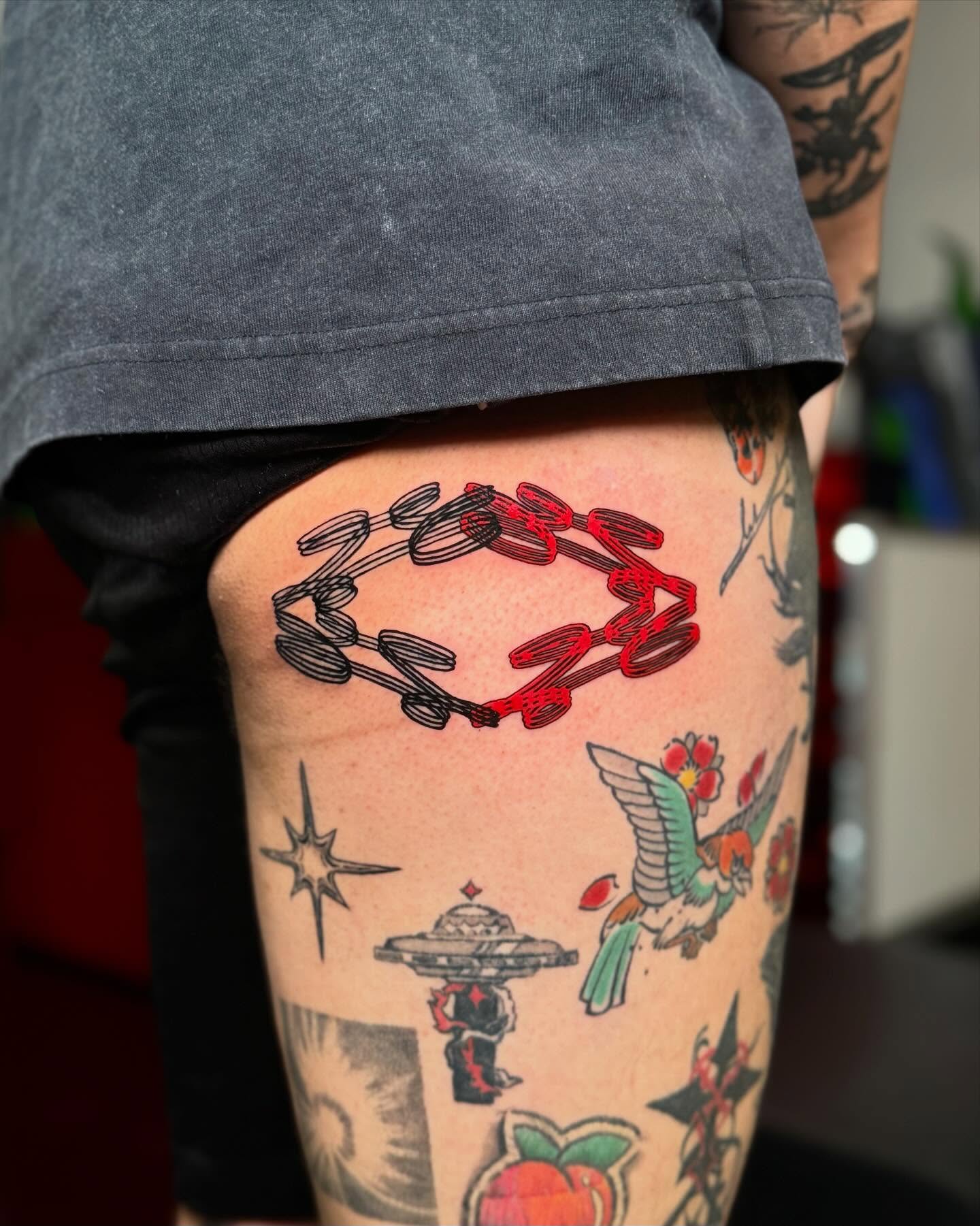 Ring American traditional tattoo on the thigh by Scott!!!
