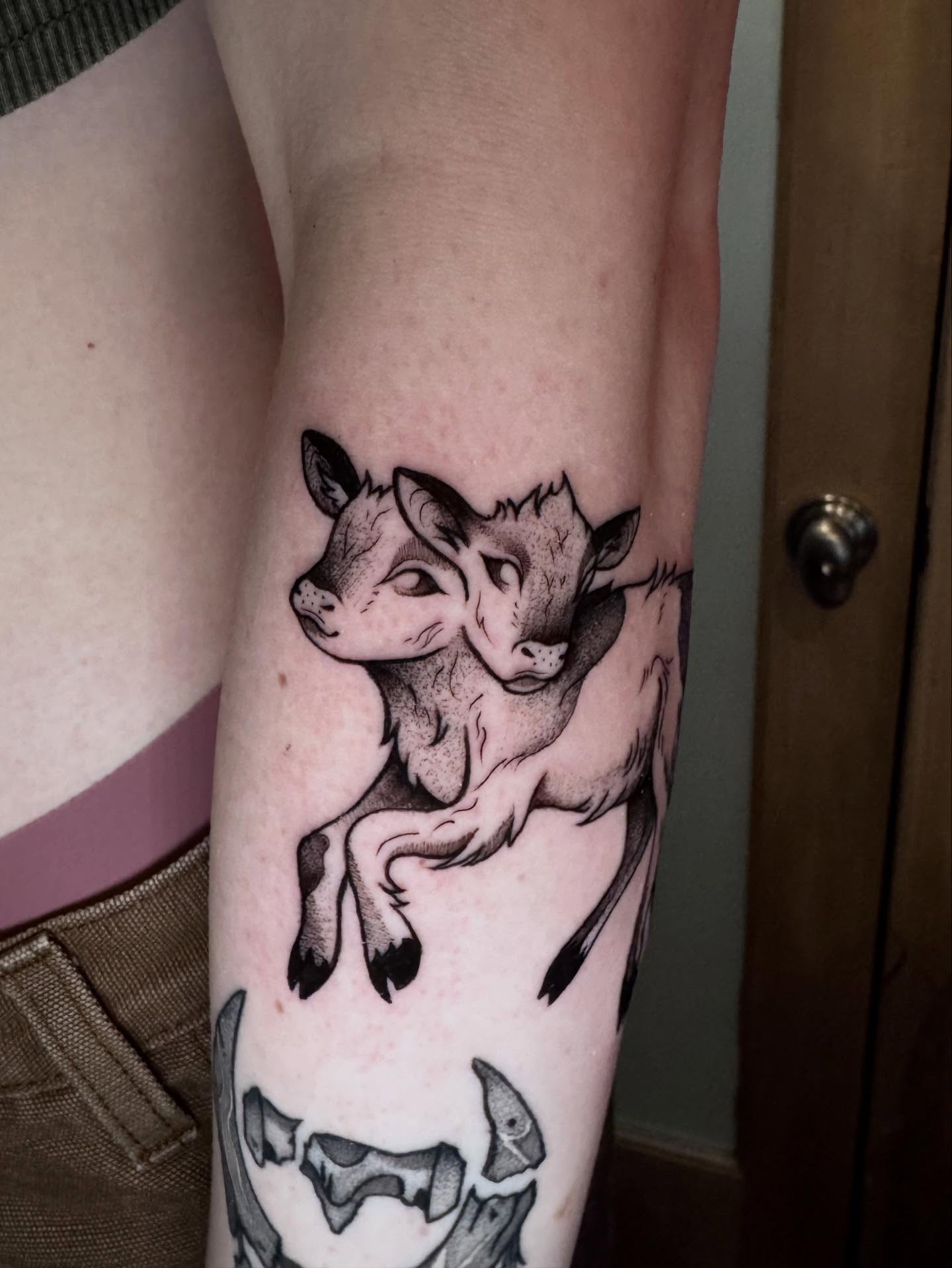 Goats black and grey tattoo on the forearm by Morgan Peeples
