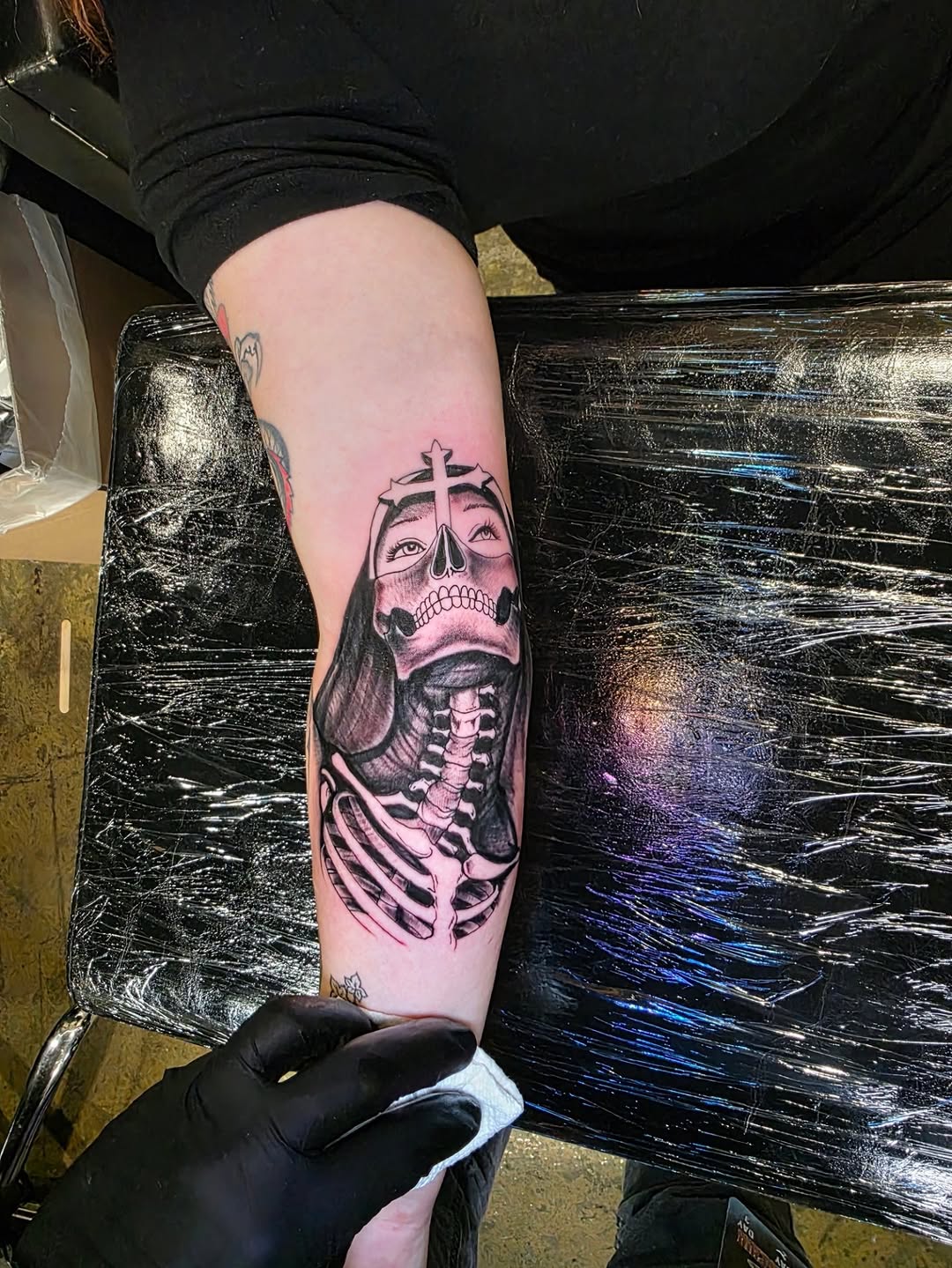 Tattoo by @tattoo_fowler — black_and_grey, dark_realism