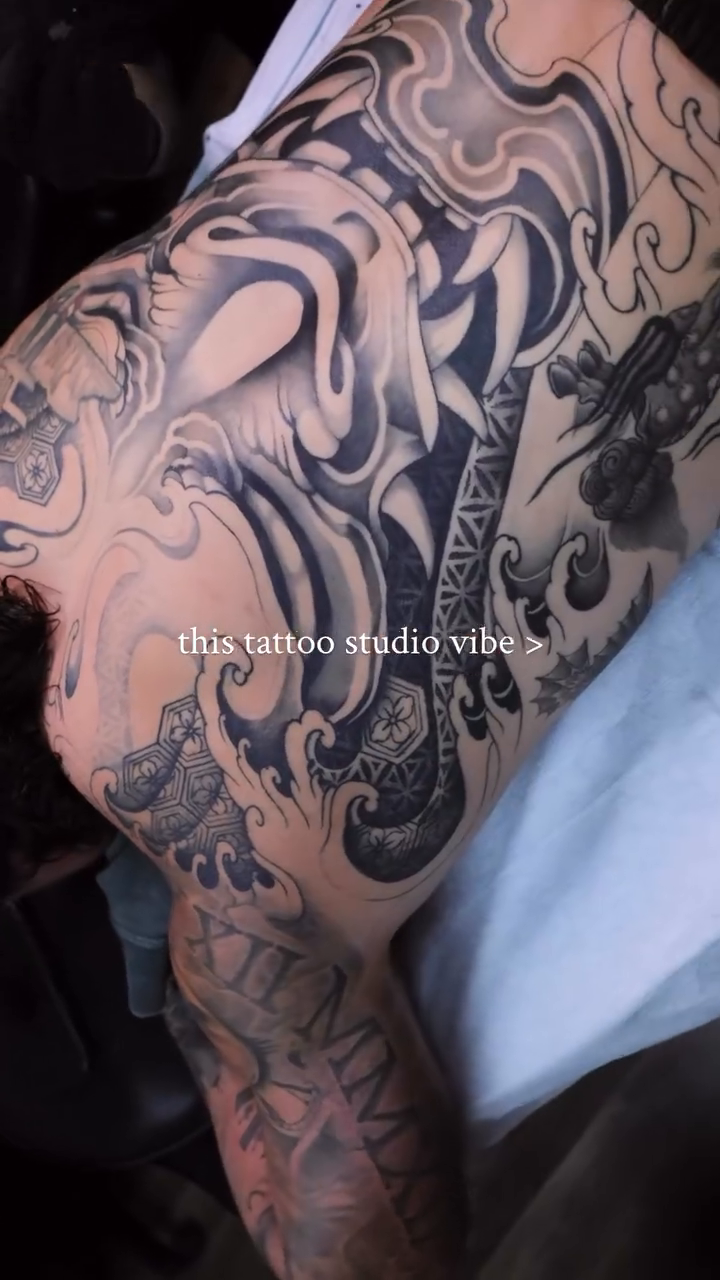 Woman with dragon and waves japanese irezumi tattoo by Carrie
