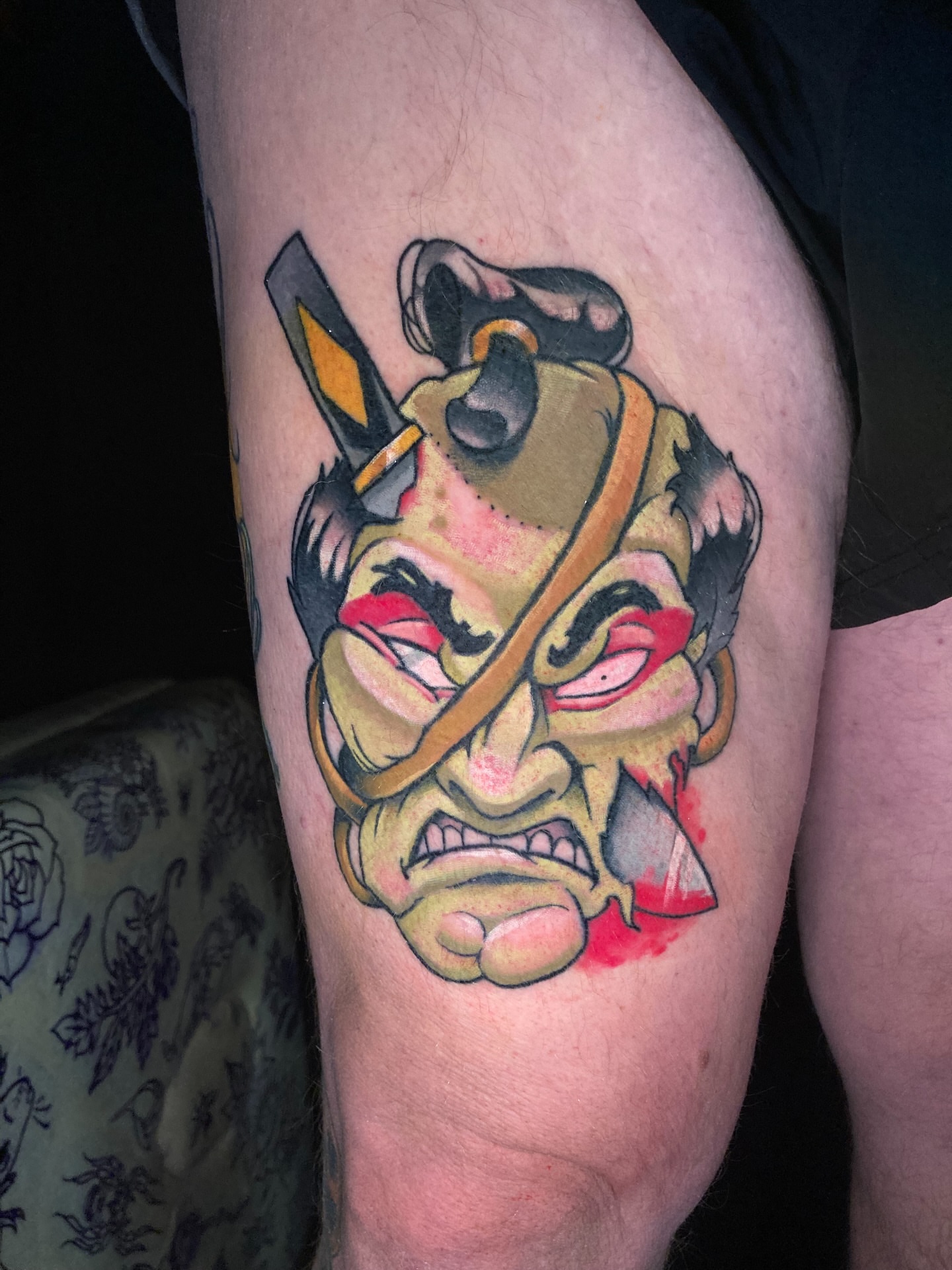 Angry samurai mask American traditional tattoo on the thigh by Eathan Hale-(East TN) Newschool Tattoo Artist