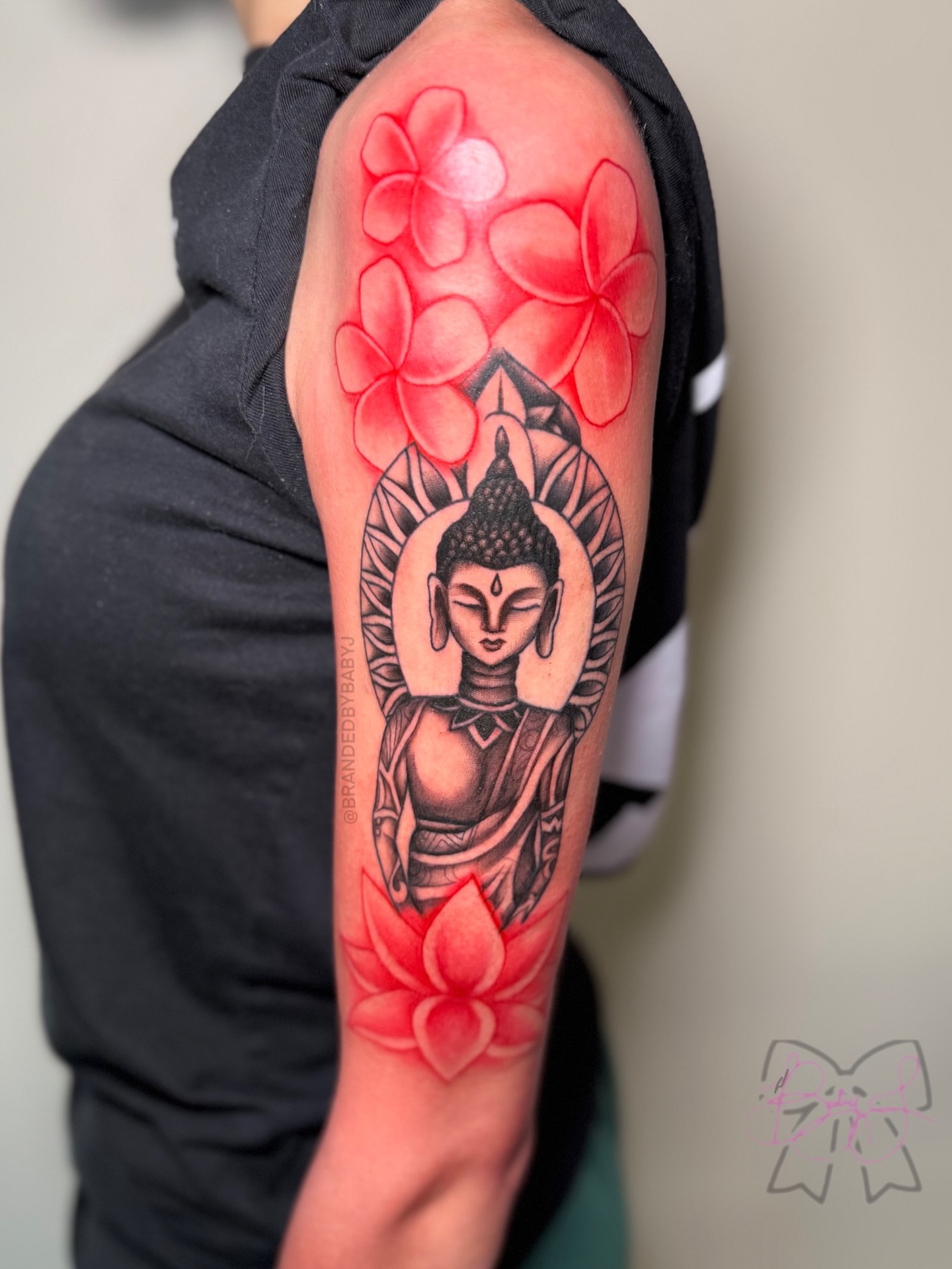 Buddha with flowers realism tattoo on the forearm by 𝔹𝔸𝔹𝕐 𝕁 ♡, Cincinnati, Ohio