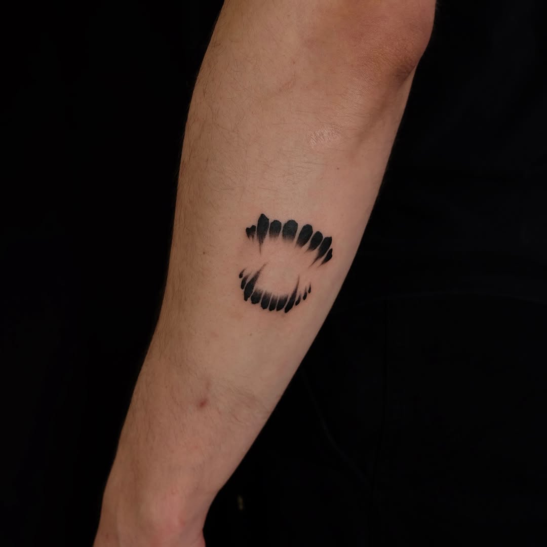 Vampire fangs dotwork tattoo on the forearm by lela
