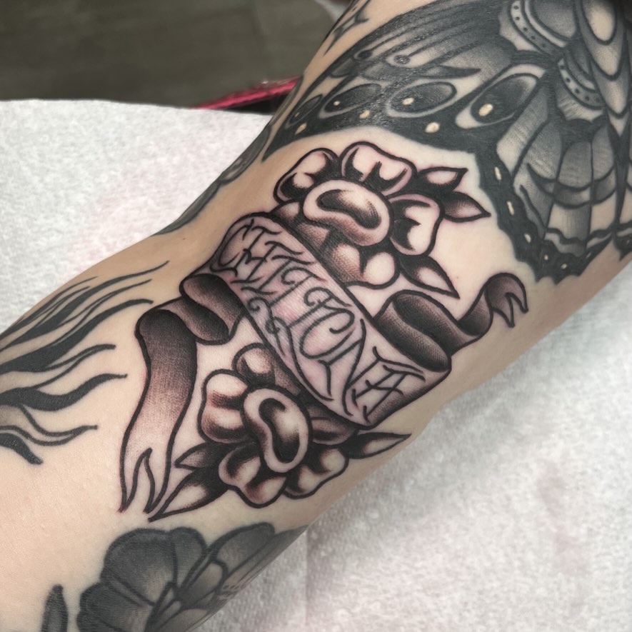 Floral bouquet American traditional tattoo on the forearm by Sky G, Colorado Springs, Colorado