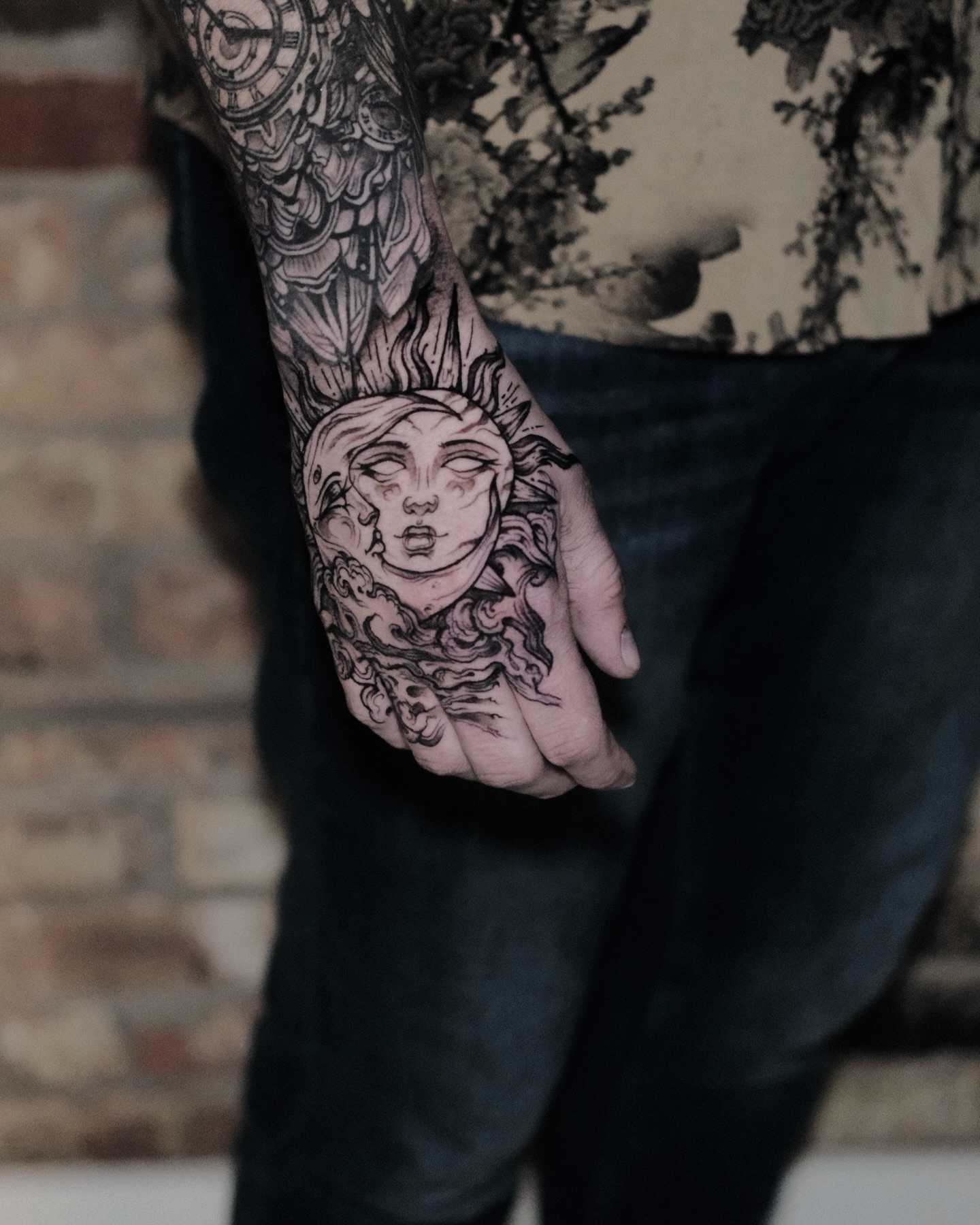 Sun and moon realism tattoo on the forearm by Macayla Myers