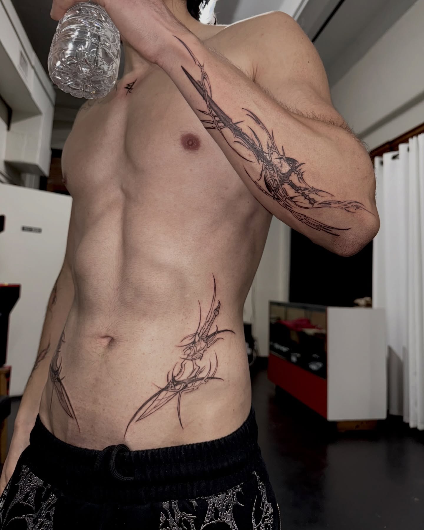 Abstract dragon black and grey tattoo on the torso by G̵̨̗̗̈̅̓́͡ĕ̸̡̜̫̾̌̎̈͠ë̷̢̳̤̰̗͈̃͌͒̚͞