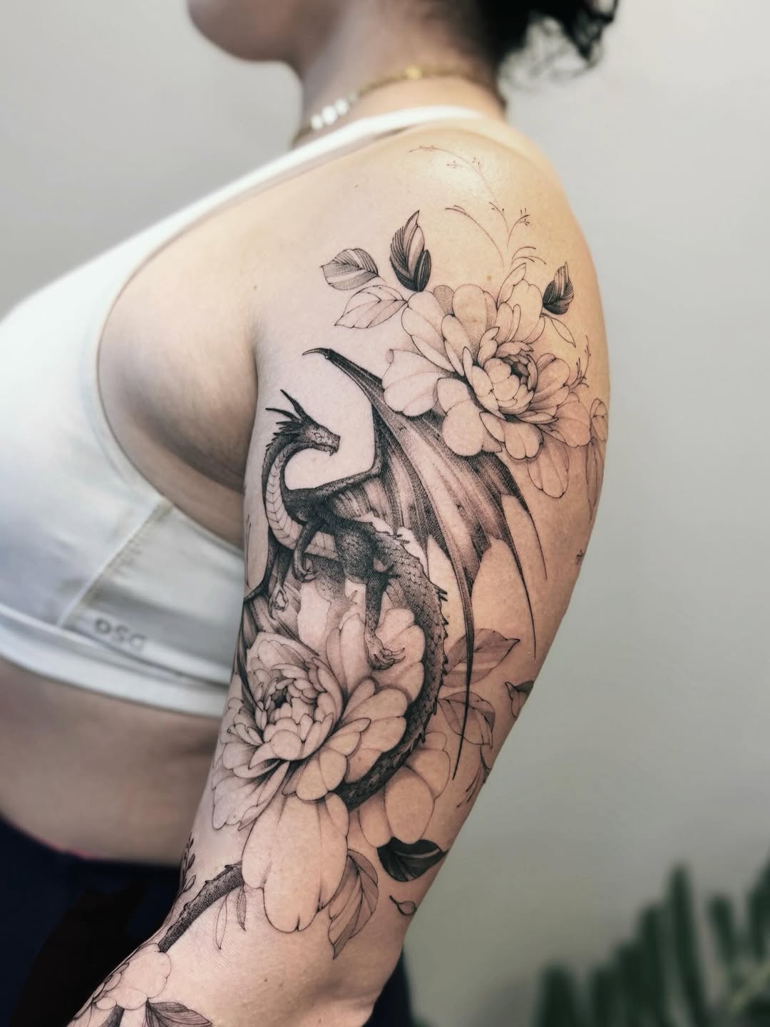 Tattoo by @angel.flow144 — black_and_grey, realism