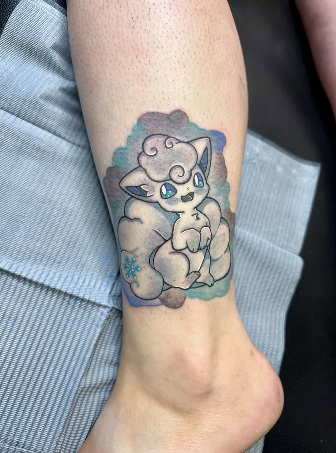 Pokemon Vulpix new school tattoo on the forearm by Sk Pierce