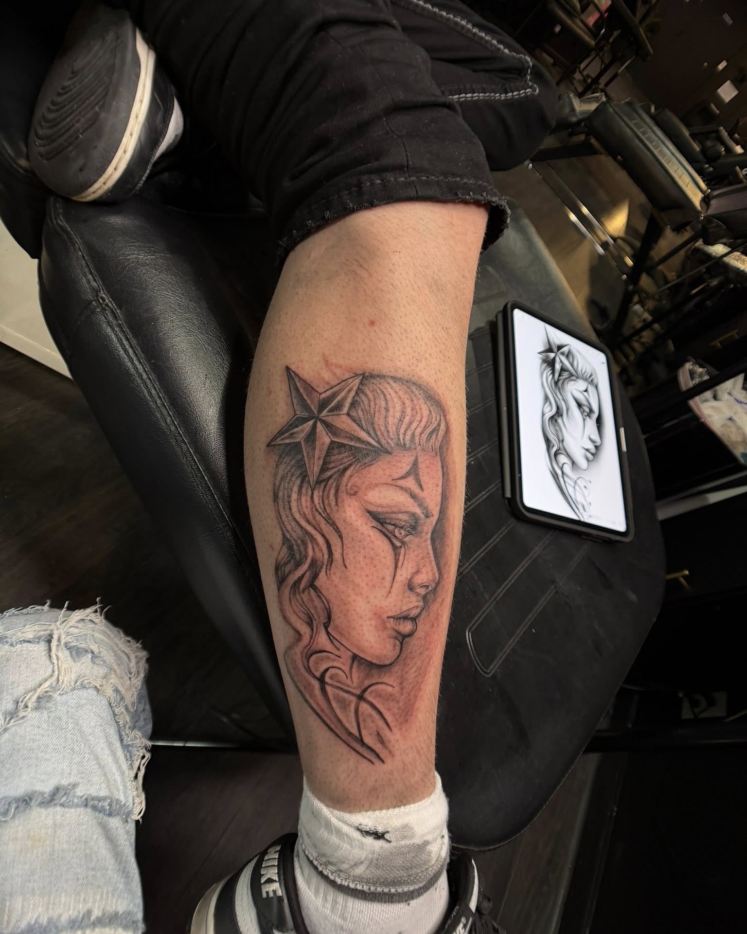 Woman's face realism tattoo on the forearm by Jay Kreidler