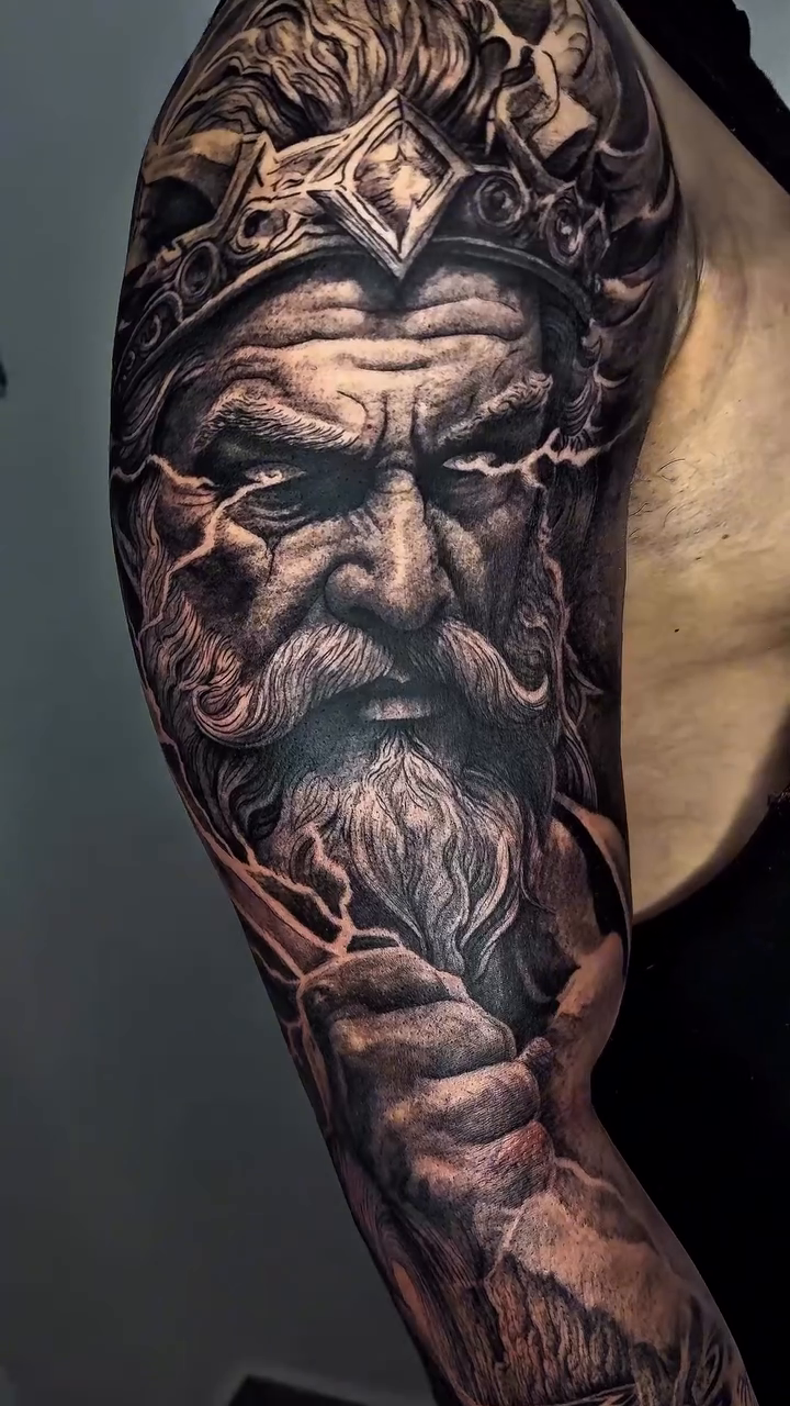 Tattoo by @elmertattoo1 — realism, black_and_grey