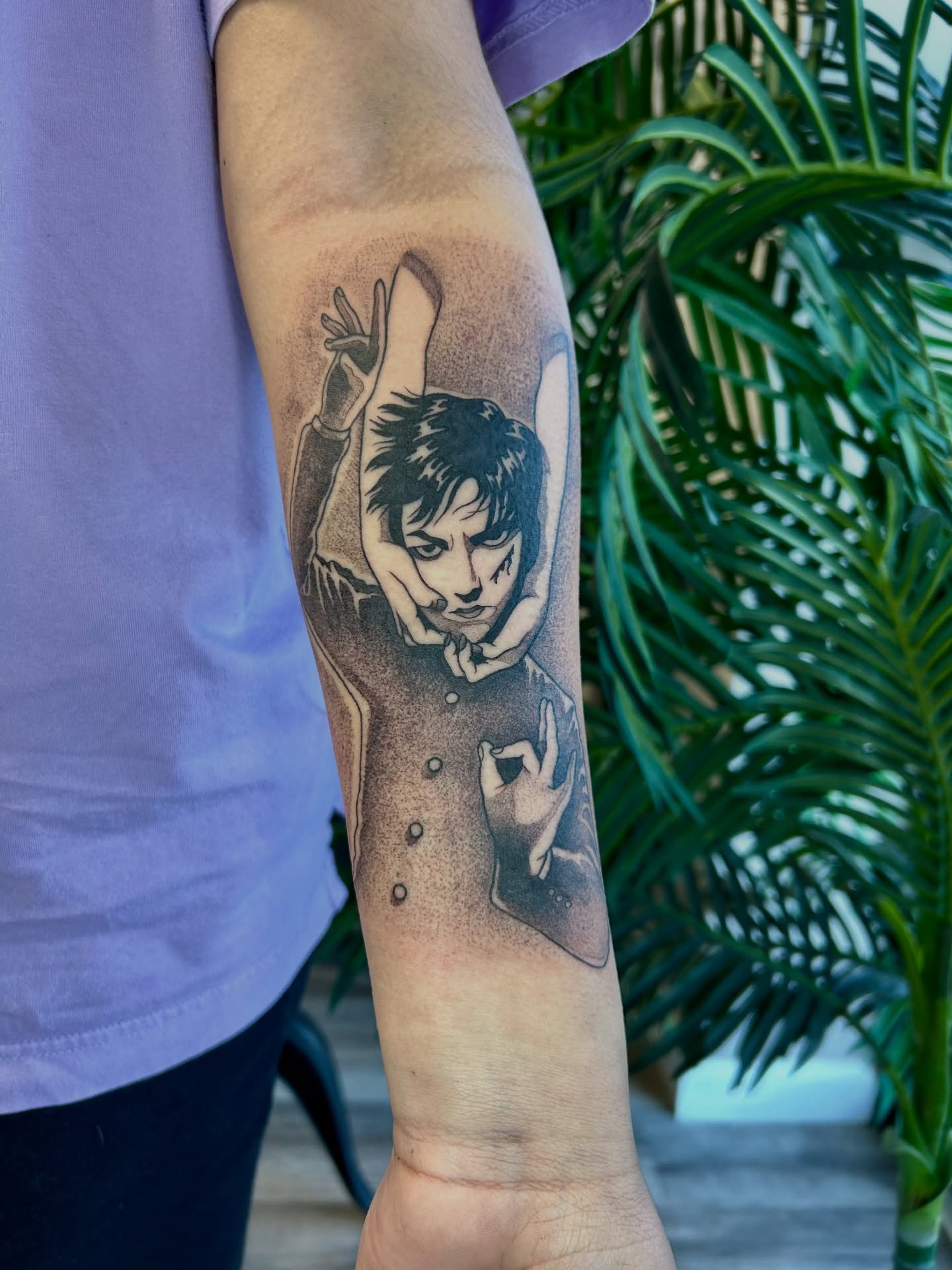 Man in suit black and grey tattoo on the forearm by Taylor Heidtbrink