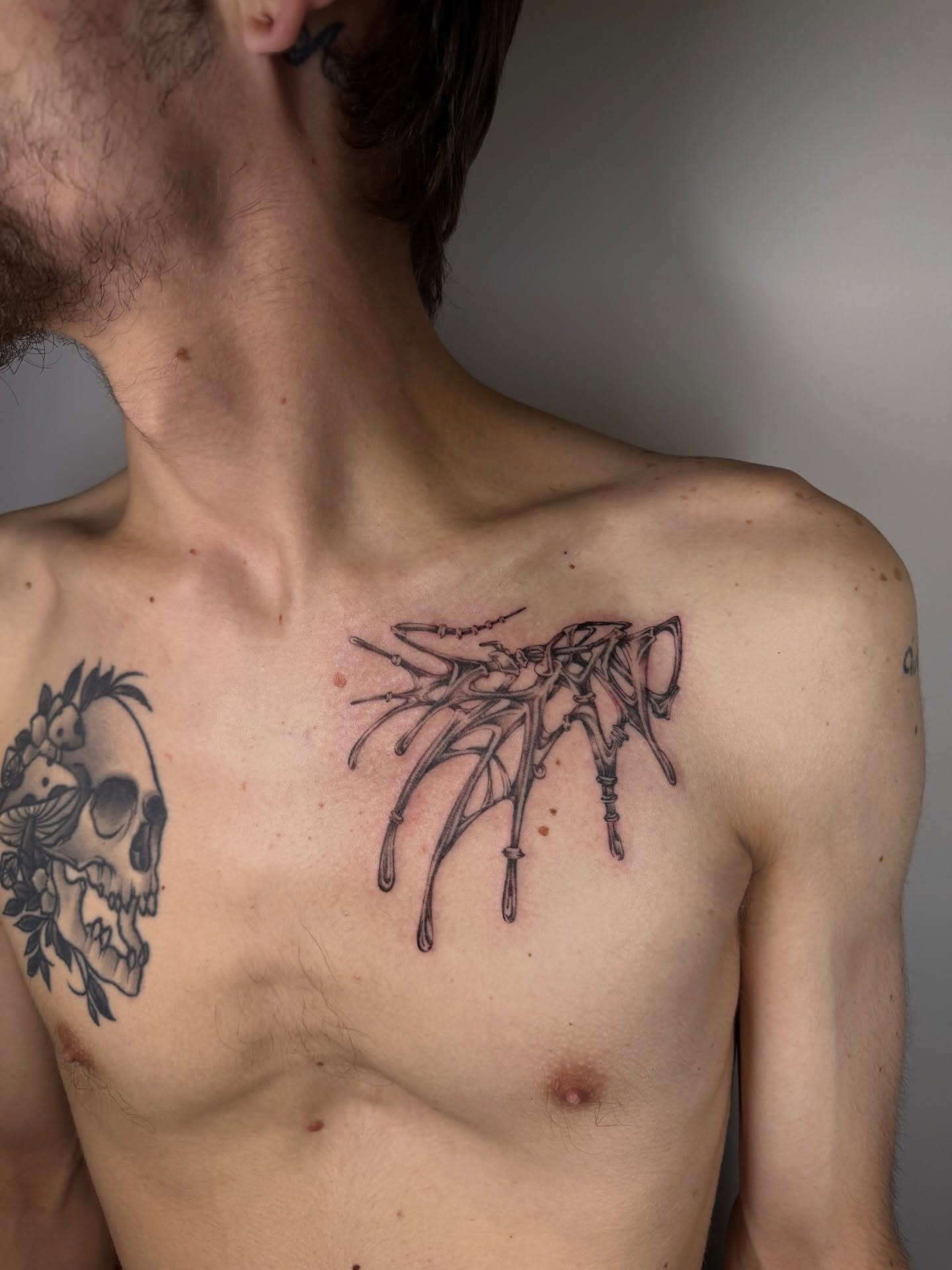 Spider black and grey tattoo on the chest by Lauren ๐