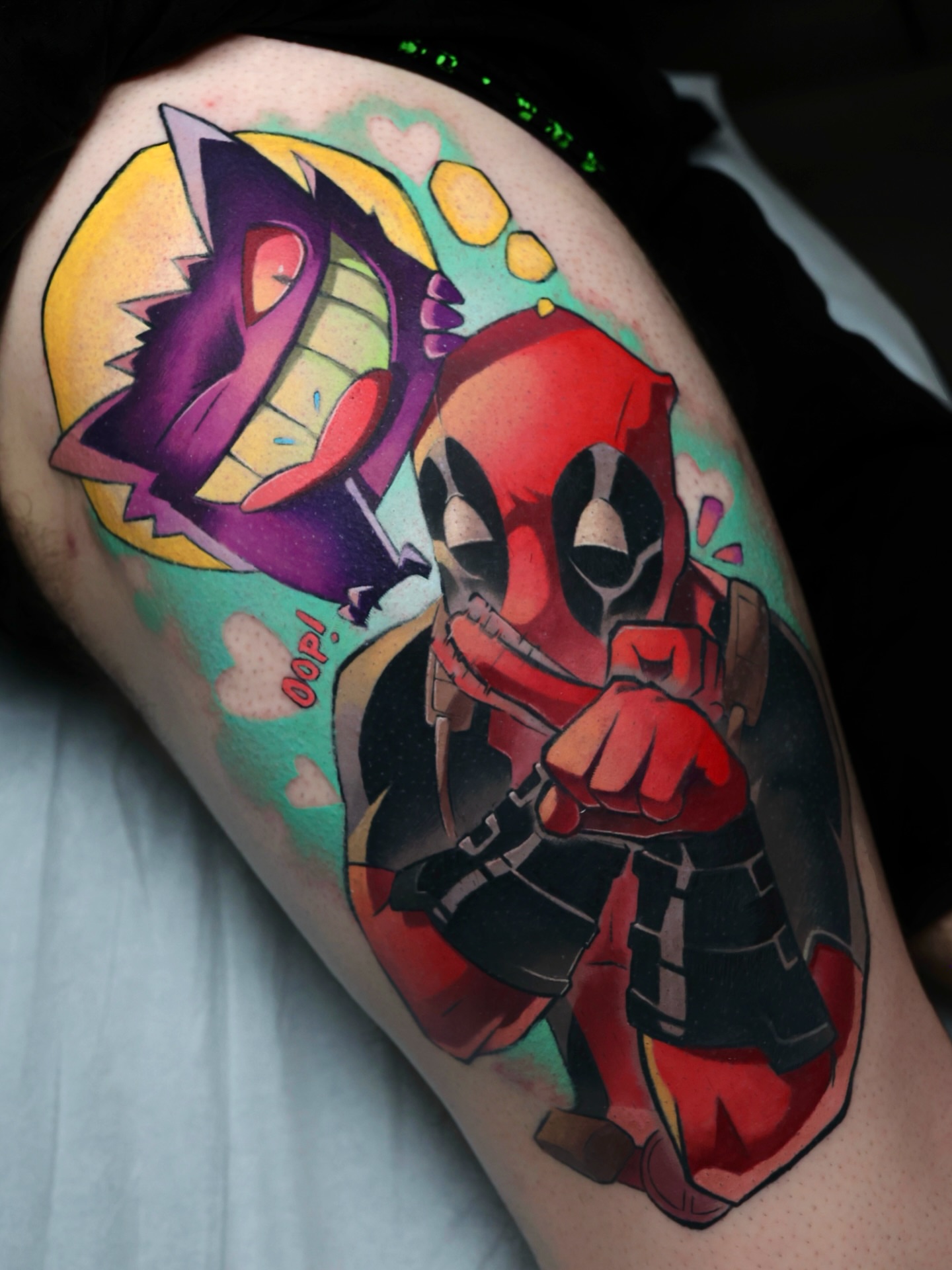Deadpool and megaman new school tattoo on the thigh by Bee Rye
