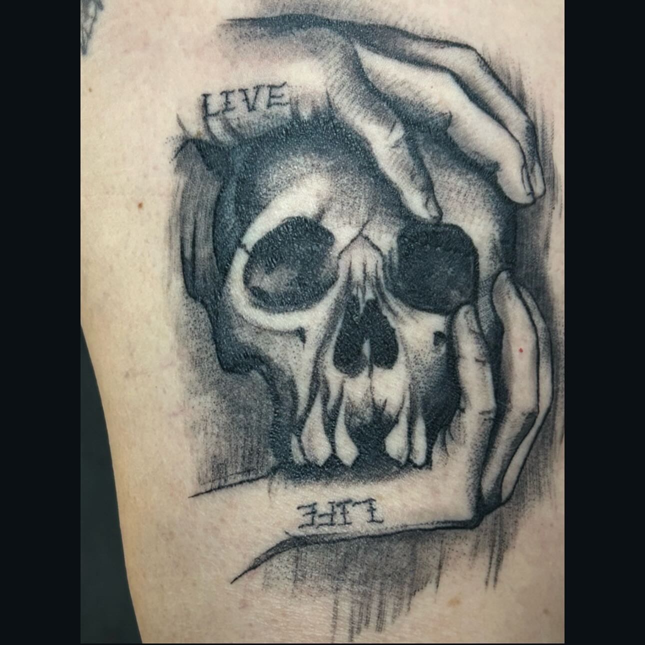 Skull realism tattoo on the forearm by Raul Najera Tattoo, Plano, Texas