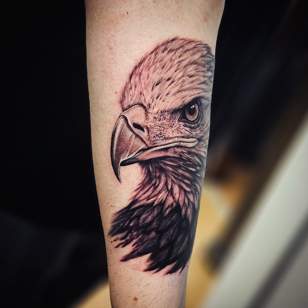 Eagle head portrait realism tattoo on the forearm by Isaac Morales