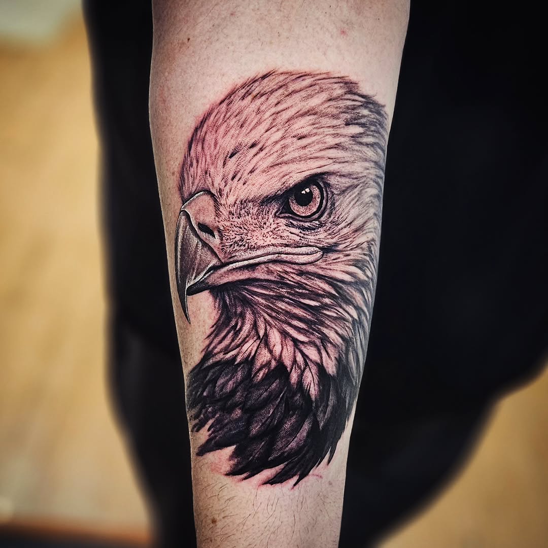 Eagle head realism tattoo on the forearm by Isaac Morales