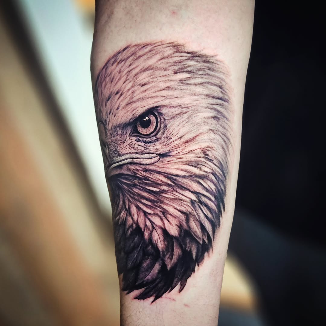 Eagle head realism tattoo on the forearm by Isaac Morales