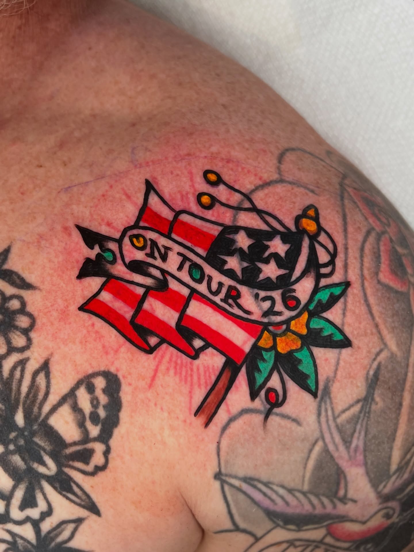 American flag and text American traditional tattoo on the shoulder by 💥Jeff Klug💥, Austin, Texas