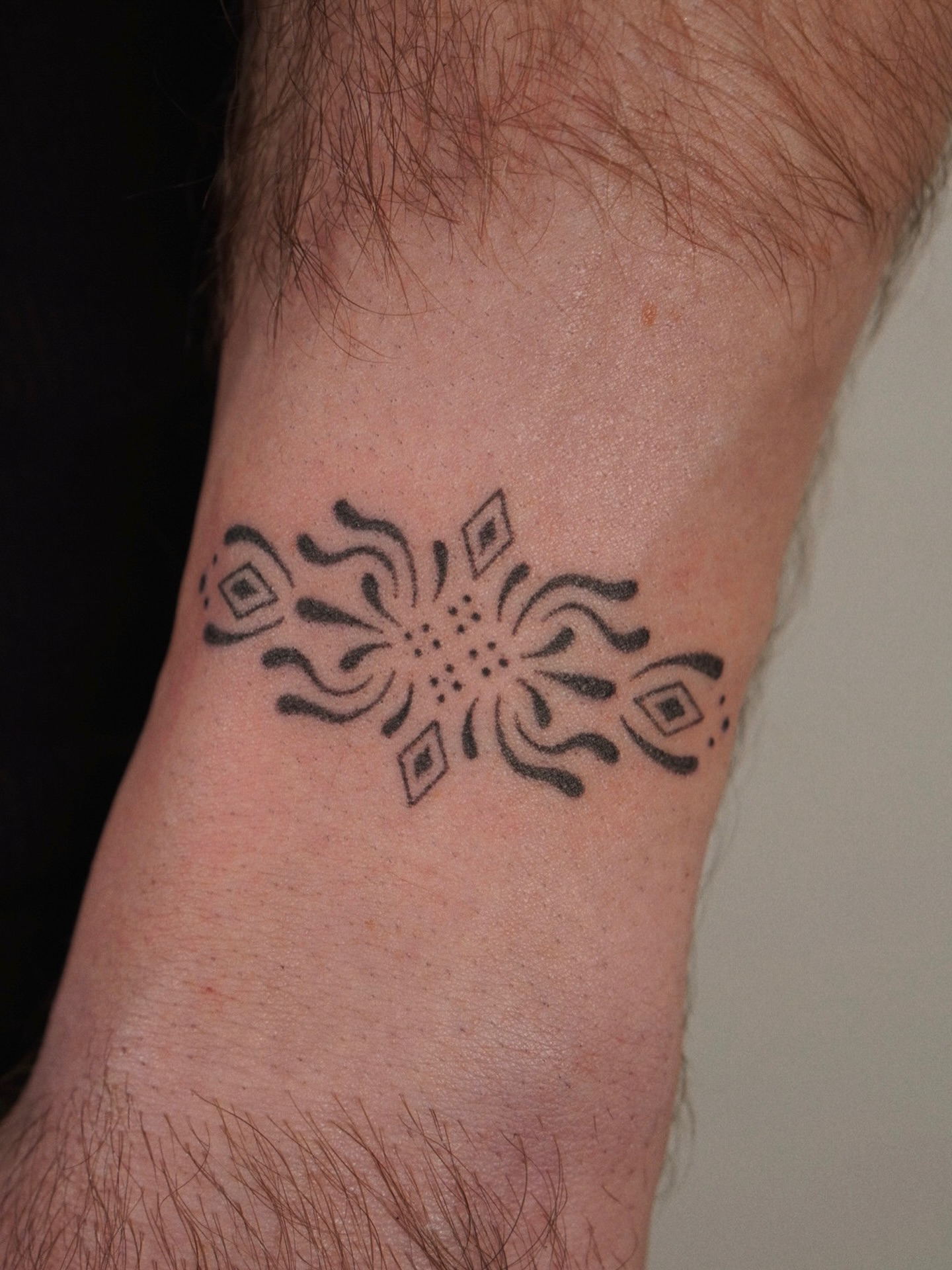 Geometric pattern geometric tattoo on the forearm by IVY K ༄ ATX Handpoke Artist