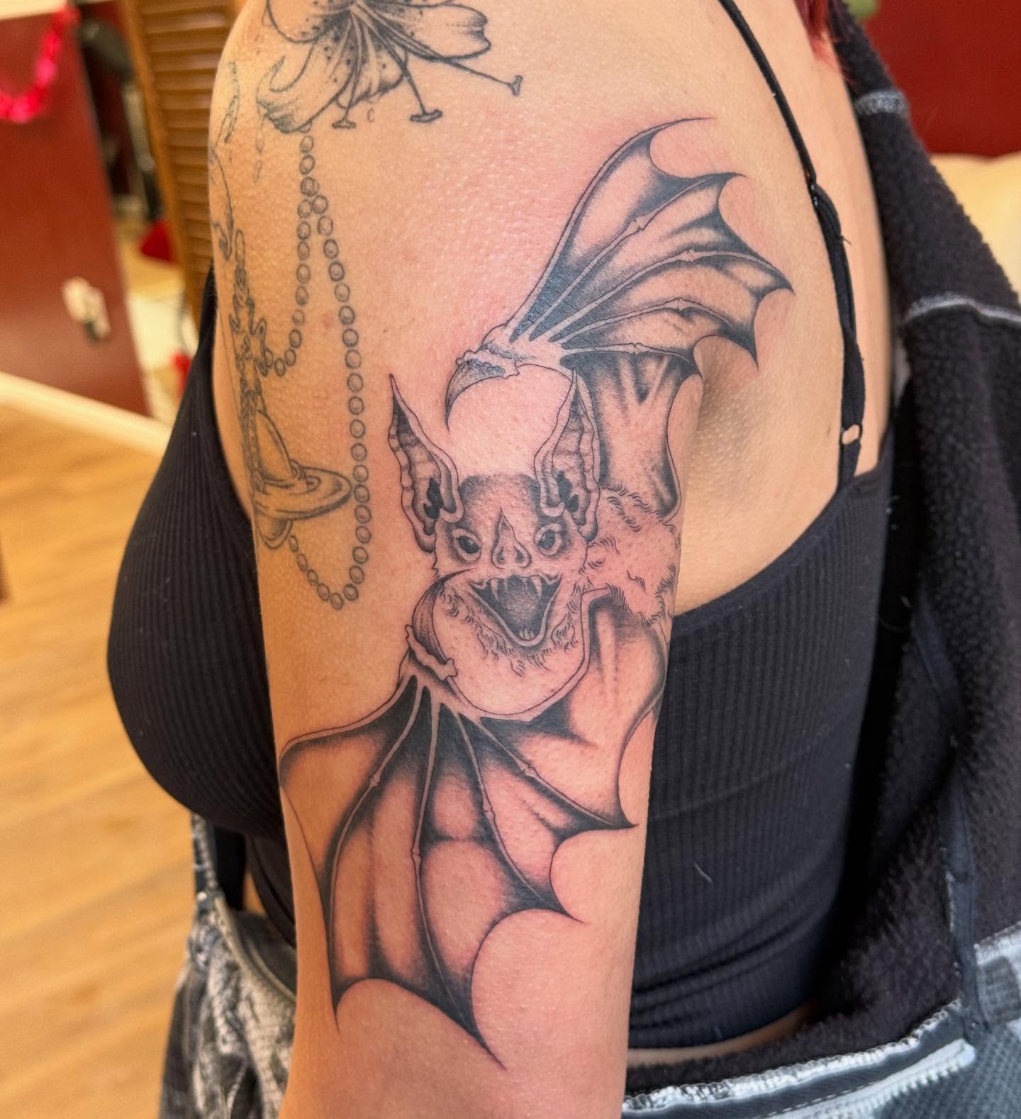 Tattoo by @raeofsunshine.tts — black_and_grey, realism