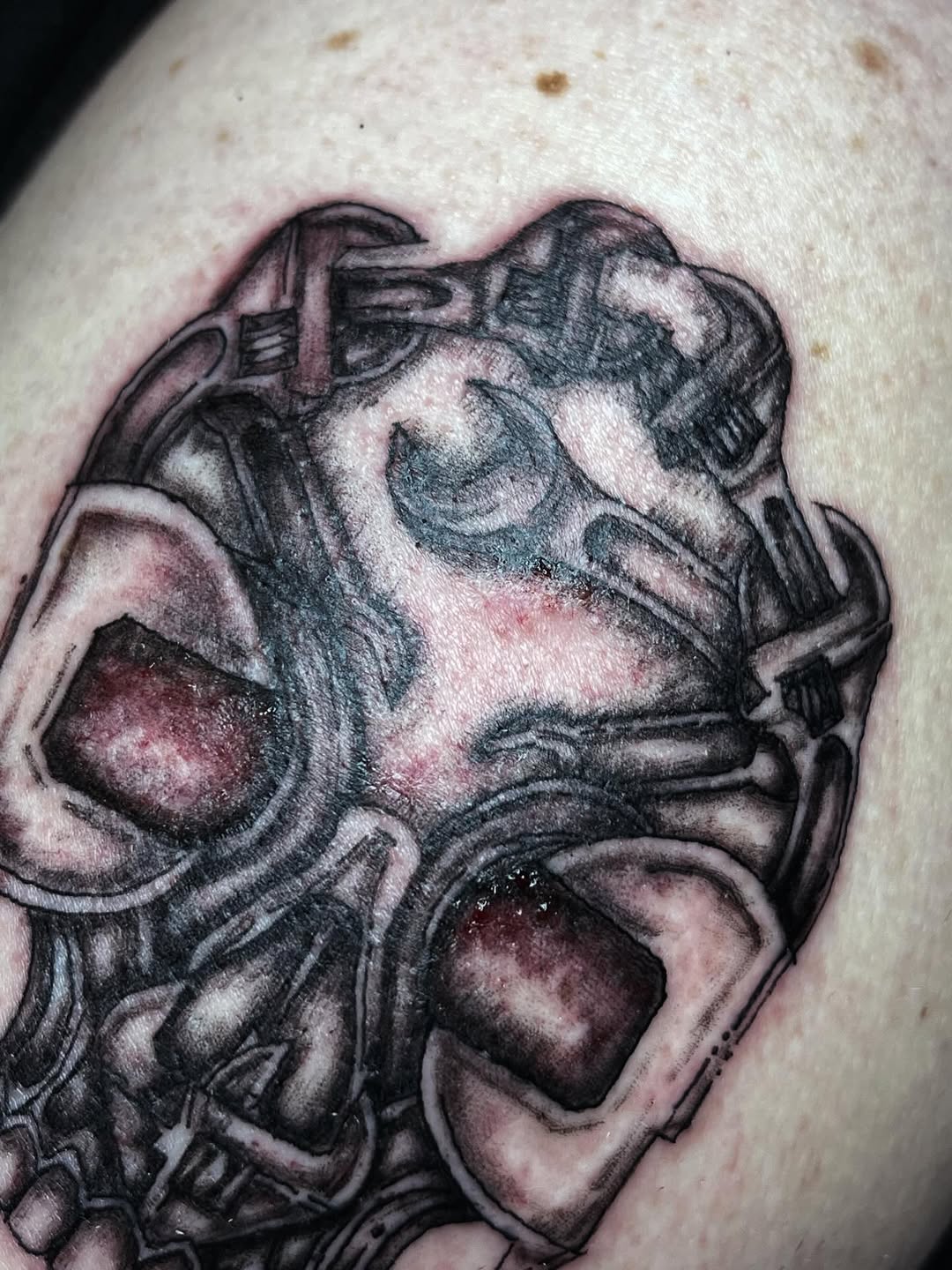 Biomechanical mask realism tattoo on the thigh by ❦julia