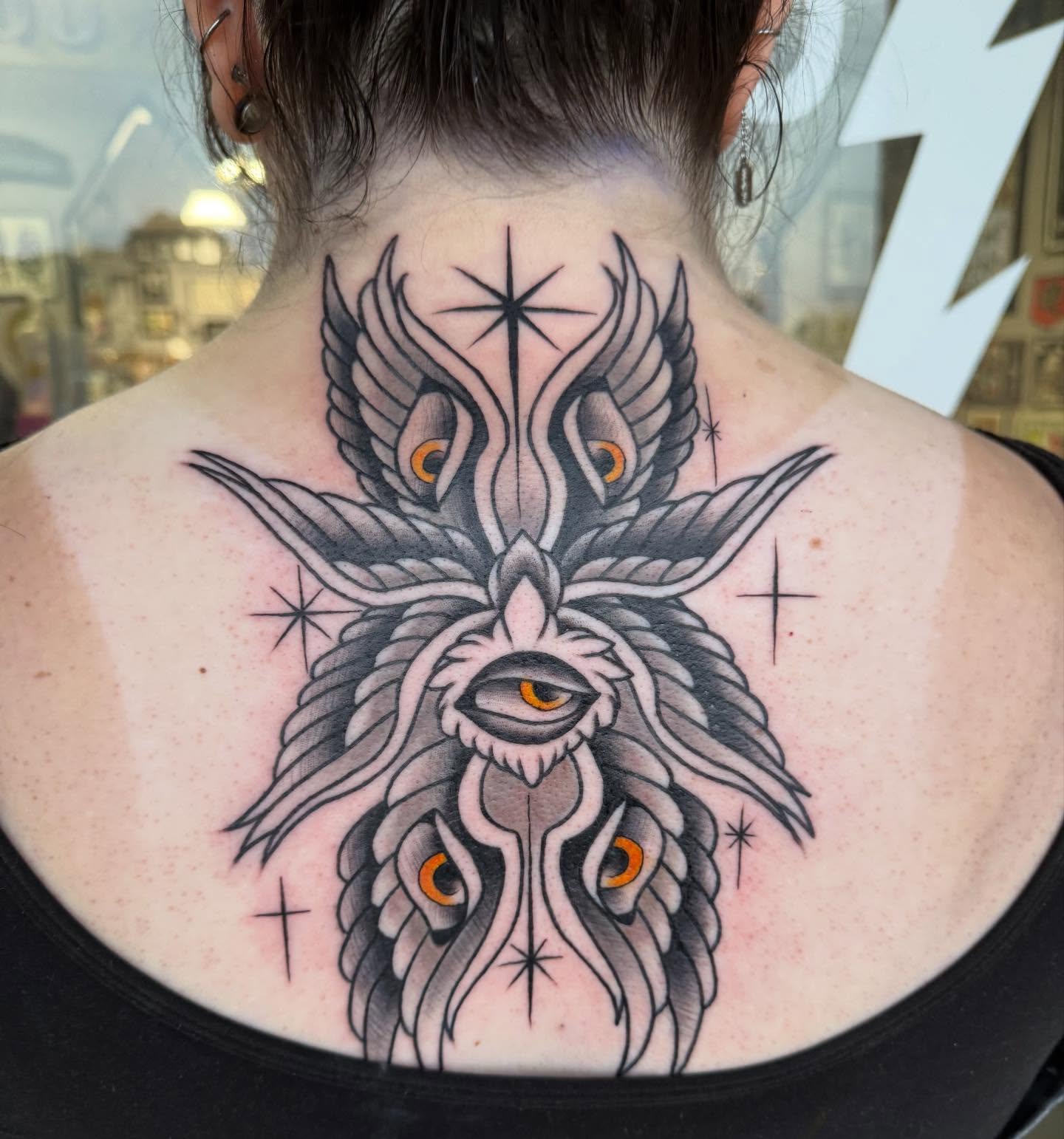 Owl American traditional tattoo on the back by Ashley matthews