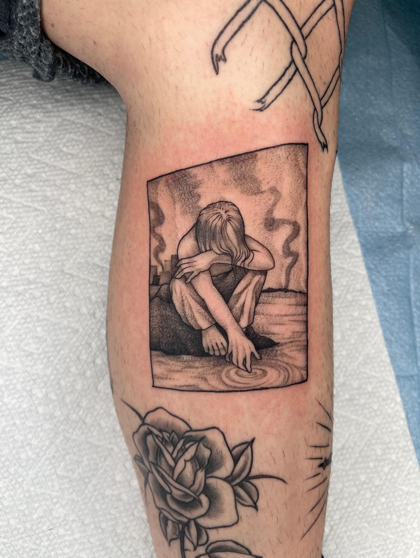 Woman crouching dotwork tattoo on the forearm by Allison Gallagher