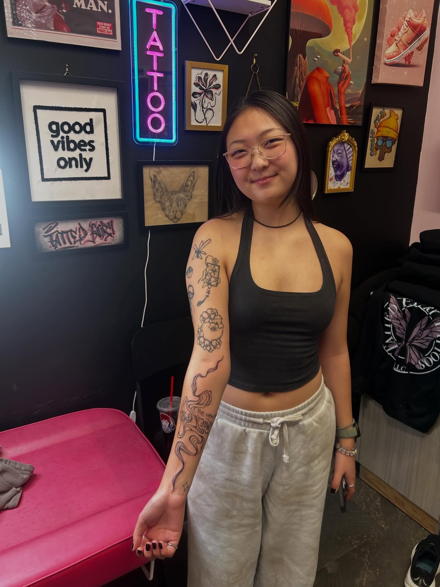 Snake and flower black and grey tattoo on the upper arm by Big Mar, Rocky Hill, Connecticut