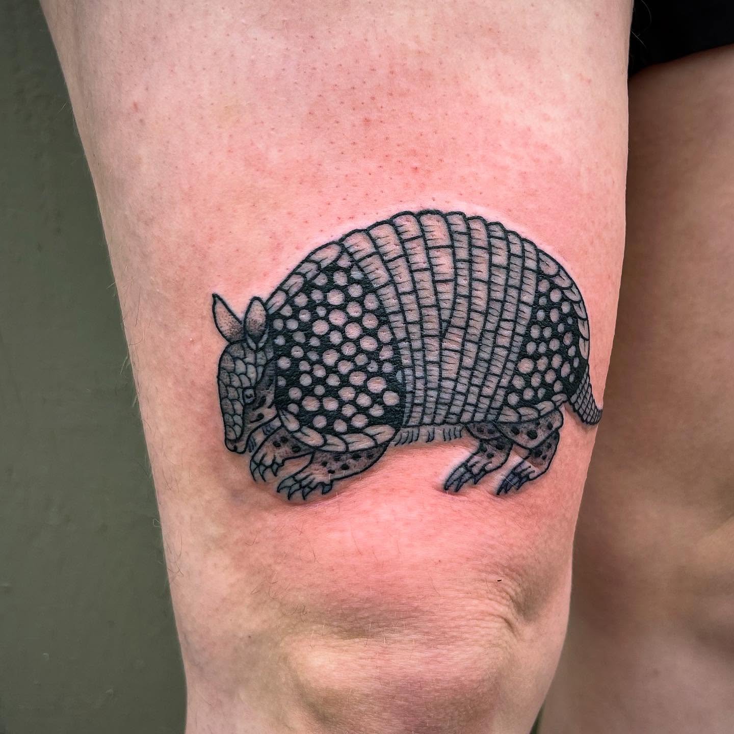 Armadillo dotwork tattoo on the thigh by Erica Finley