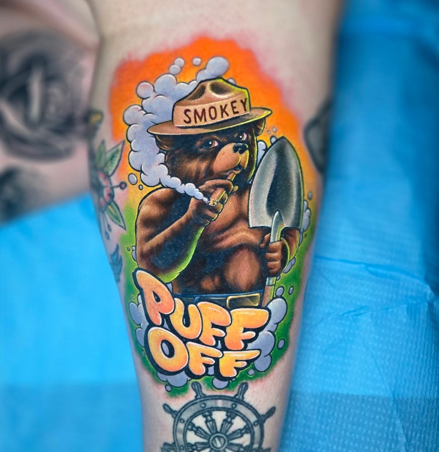 Smokey bear new school tattoo on the forearm by Jeff Stager