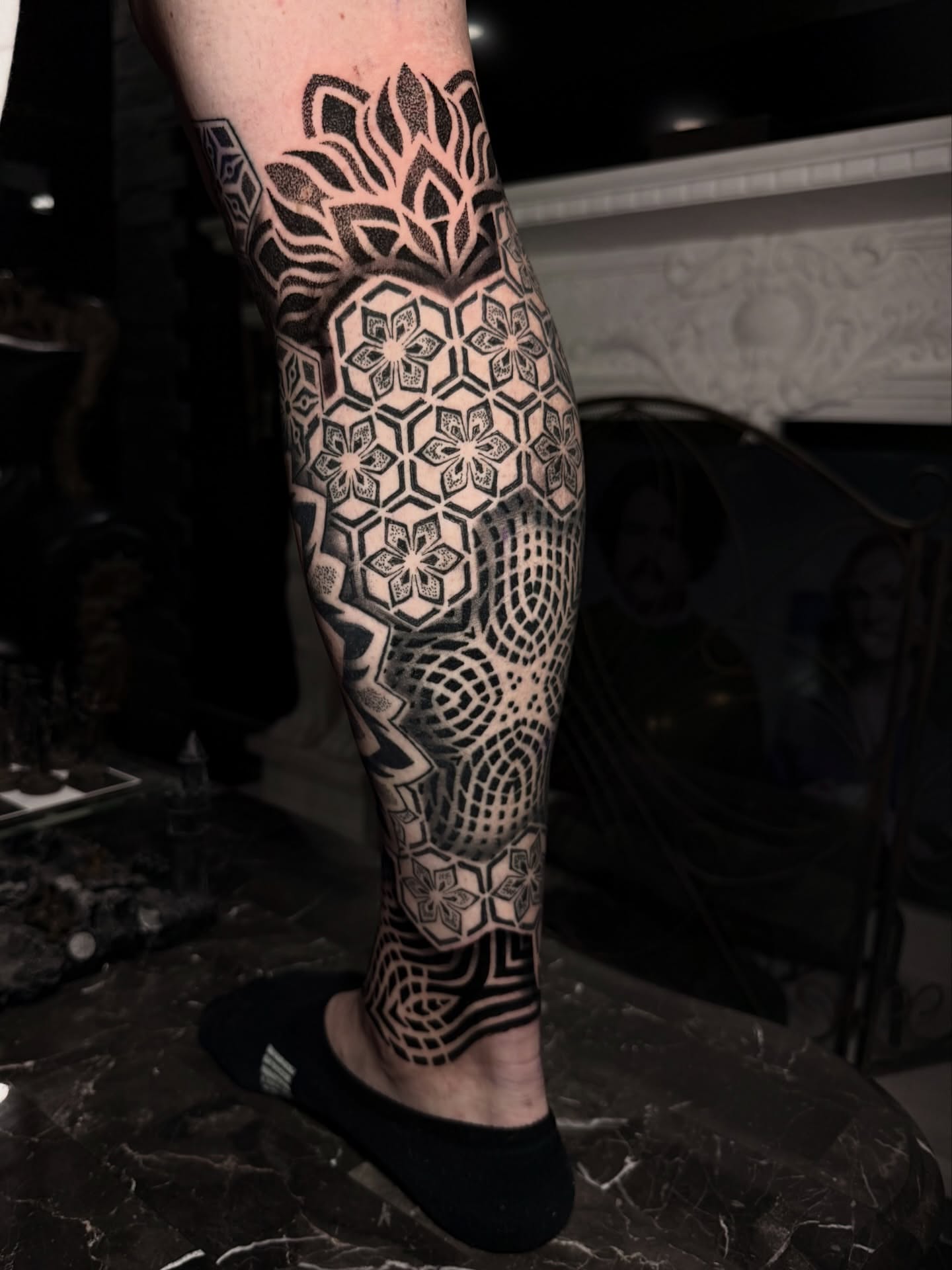 Geometric pattern geometric tattoo on the calf by Juan Carlos