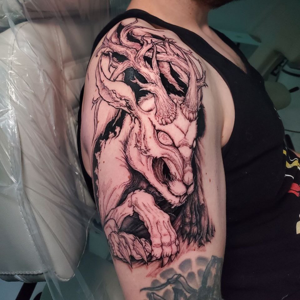 Demon dark realism tattoo on the shoulder by Matthew Ray, Harrisburg, North Carolina