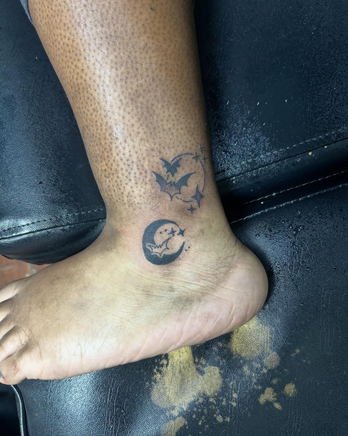 Bat and crescent moon black and grey tattoo on the foot by Jae the artist🫡