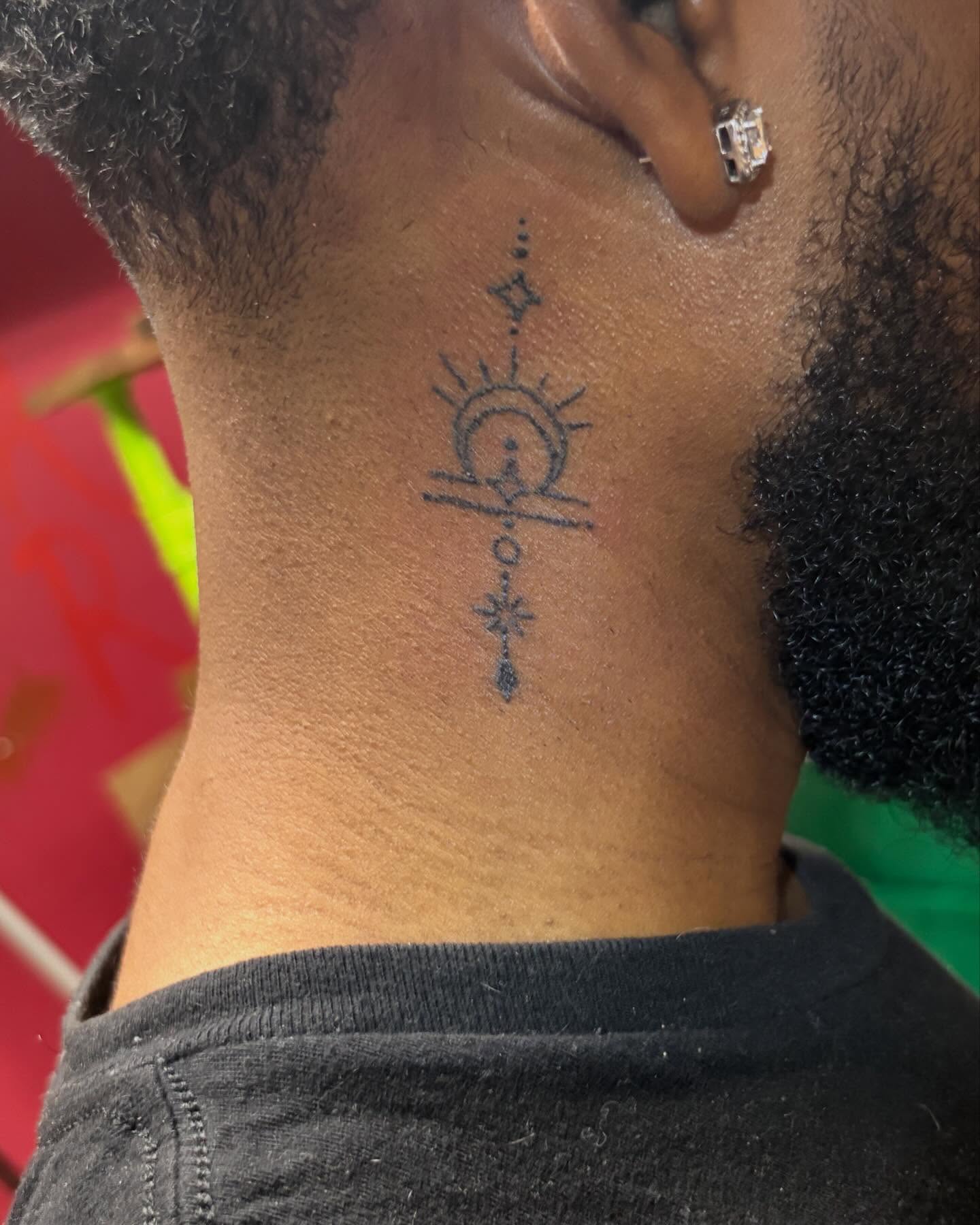 Solar symbol geometric tattoo on the neck by Jae the artist🫡