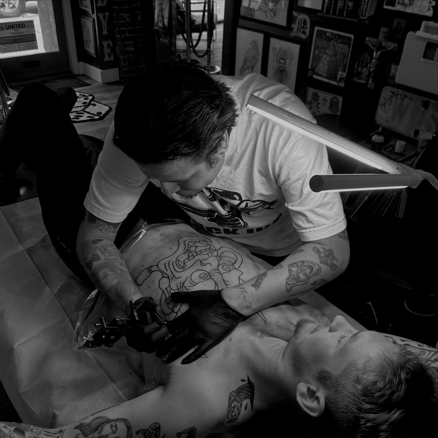 Abstract design black and grey tattoo on the chest by Anthony Robles