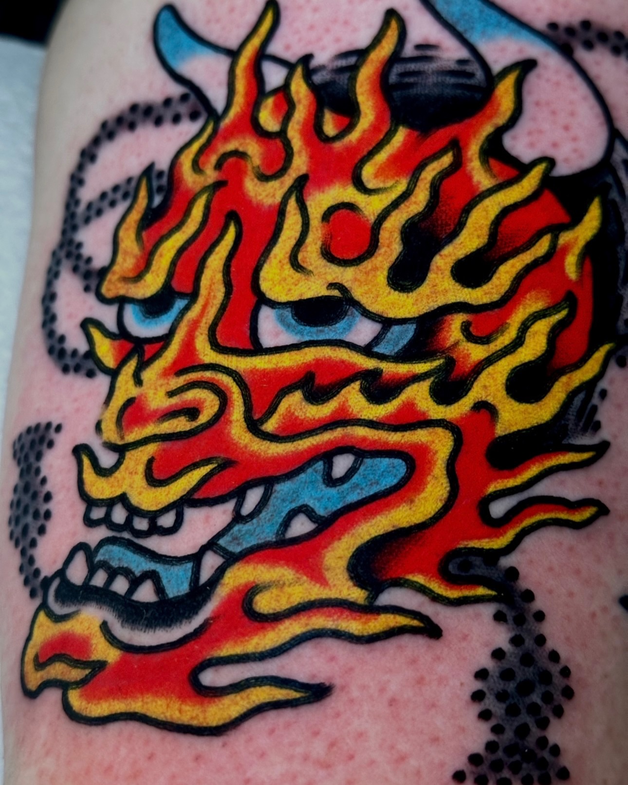 Flame American traditional tattoo on the forearm by Christian Rieben