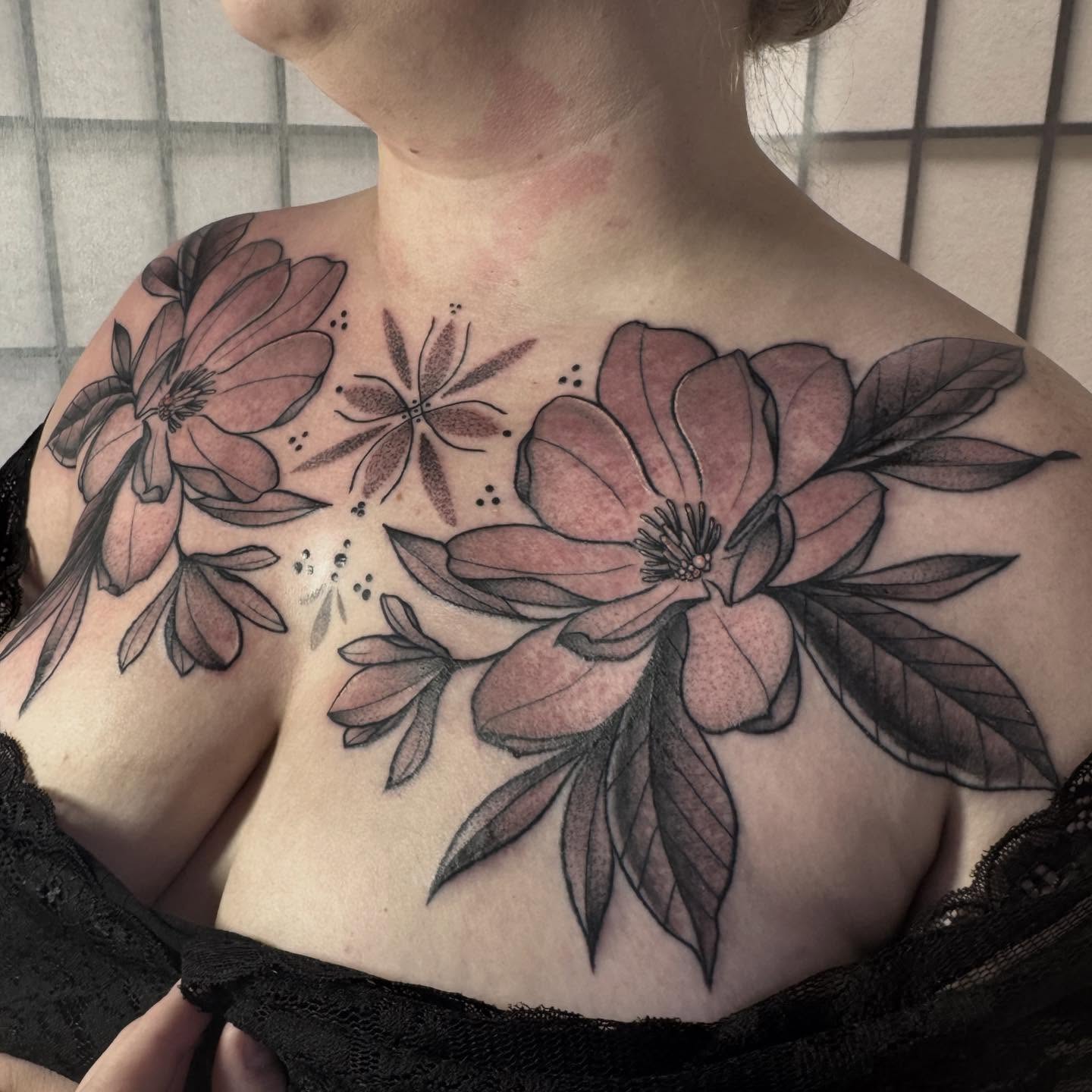 Magnolia flowers black and grey tattoo on the chest by ️️️️️Hannah Smyle