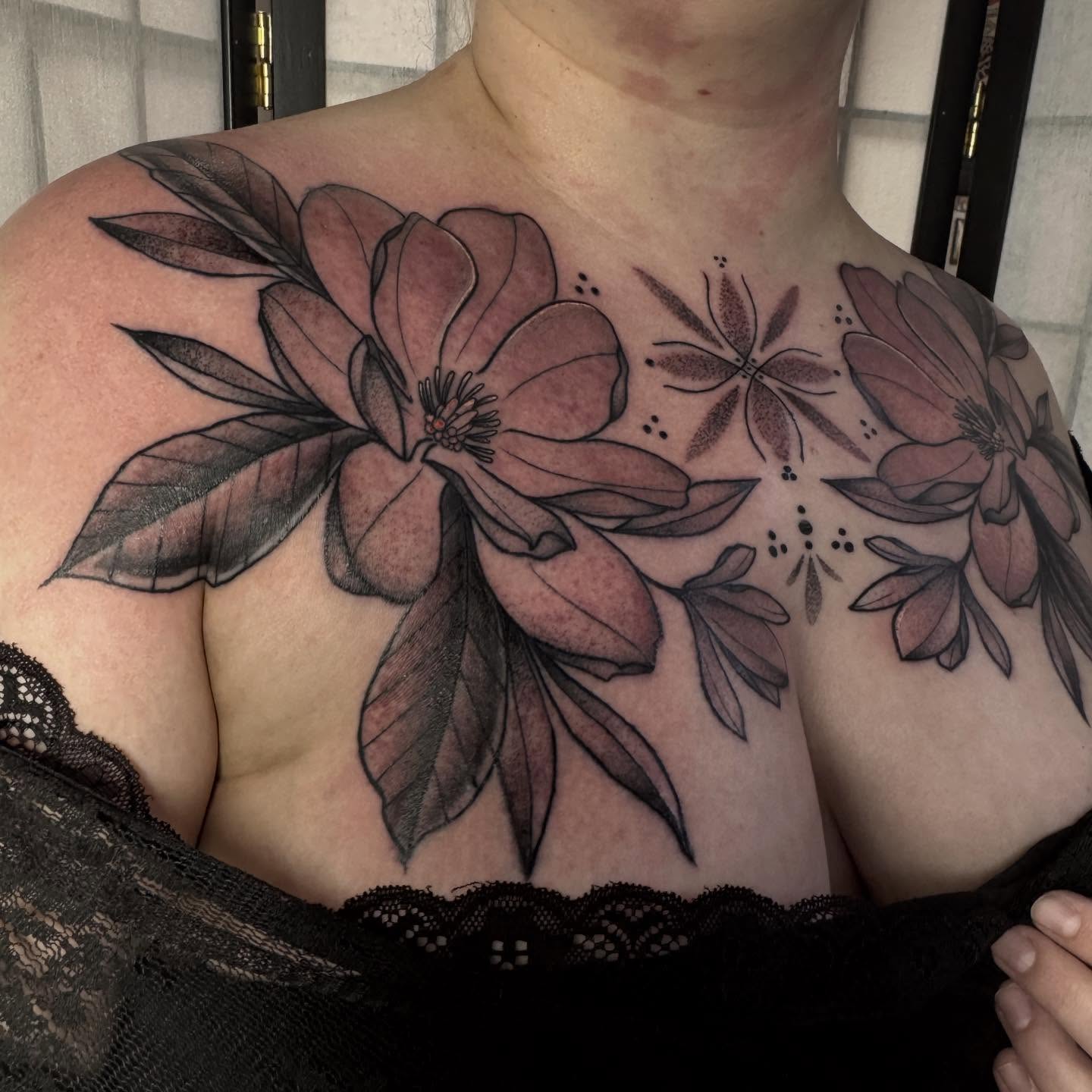 Magnolia flowers black and grey tattoo on the chest by ️️️️️Hannah Smyle