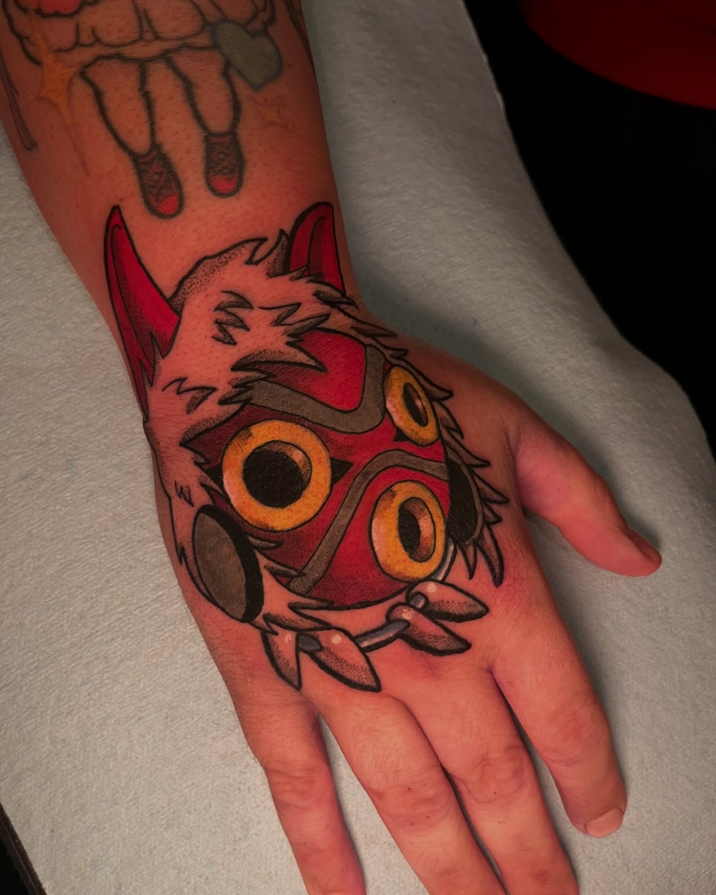 Mask dotwork tattoo on the hand by Colton🎨