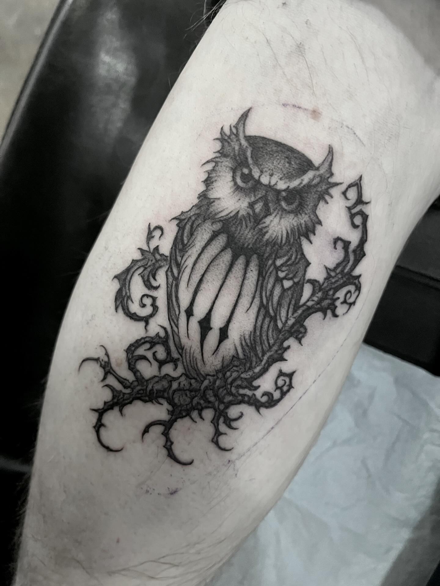 Owl dark realism tattoo on the forearm by Nathan Esteras