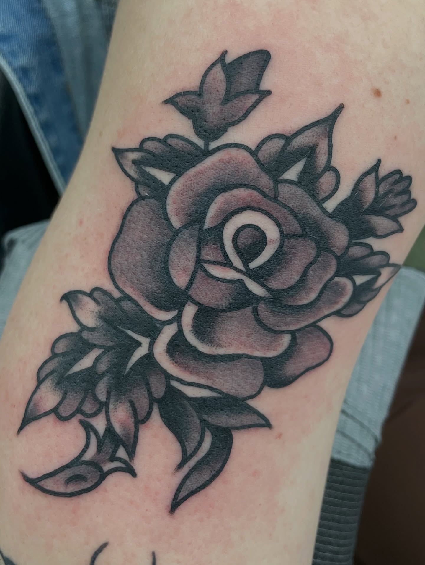 Rose black and grey tattoo on the forearm by matt nelson