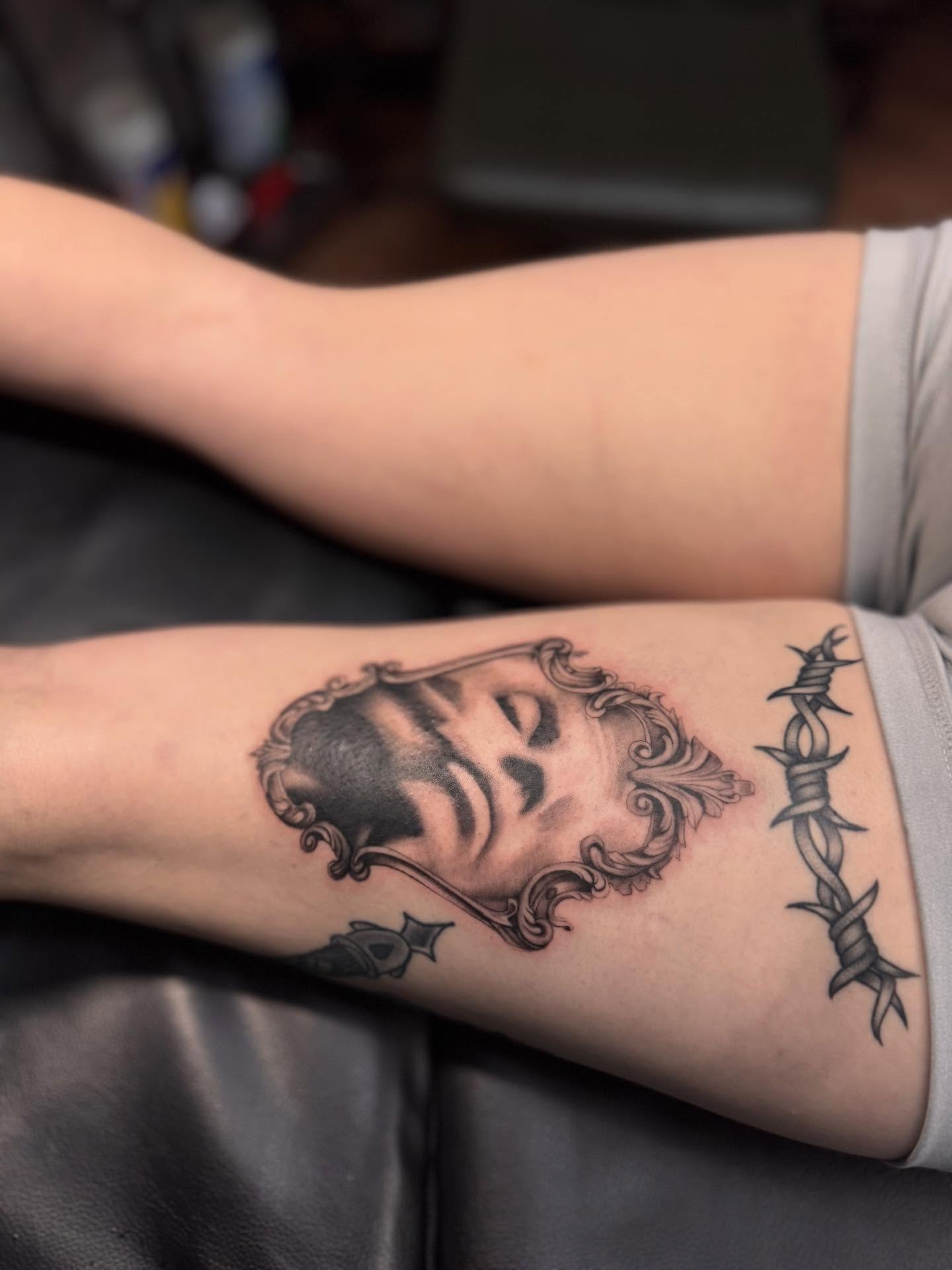 Barbed wire black and grey tattoo on the forearm by Anna