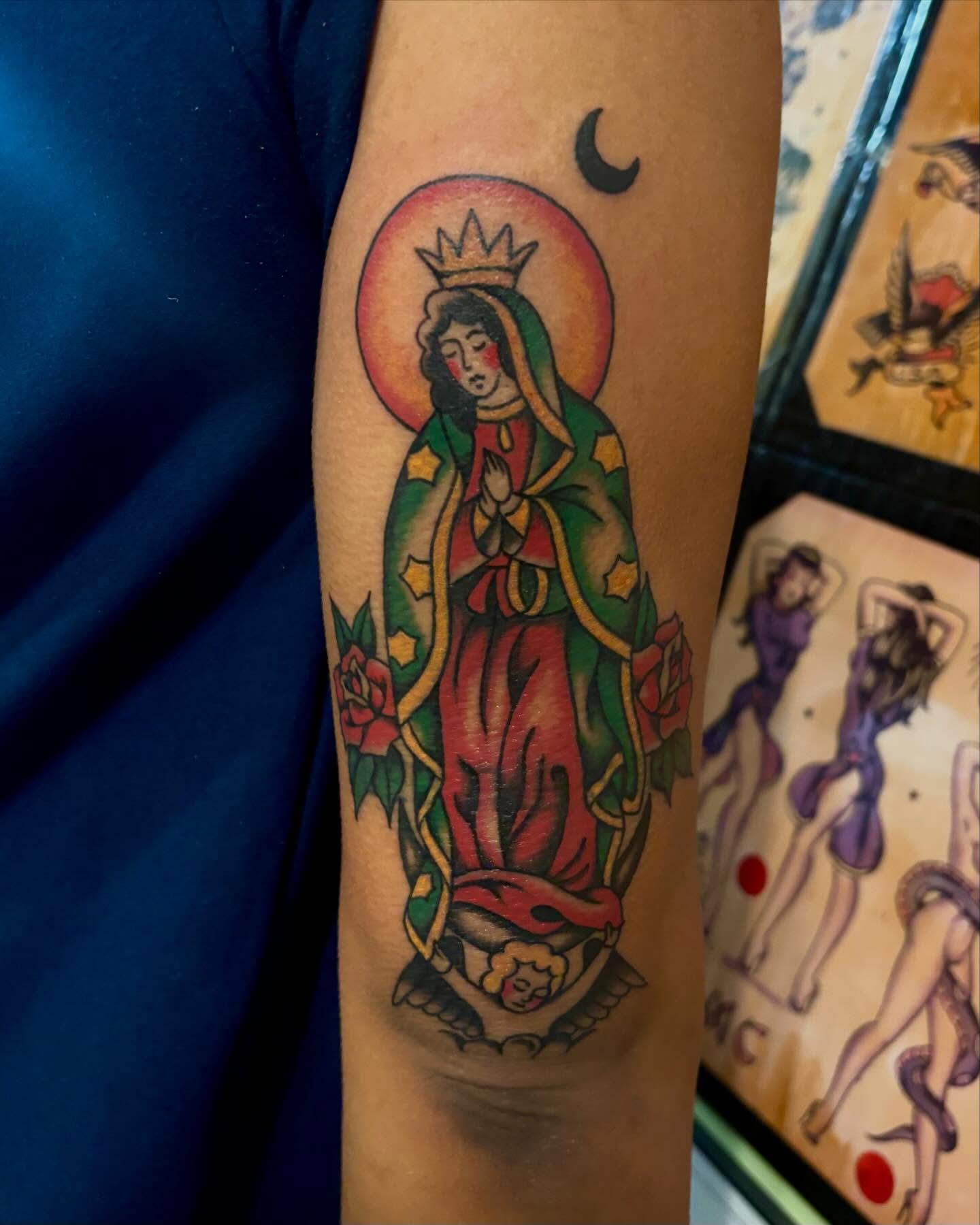 Our Lady of Guadalupe American traditional tattoo on the forearm by Tia Cave